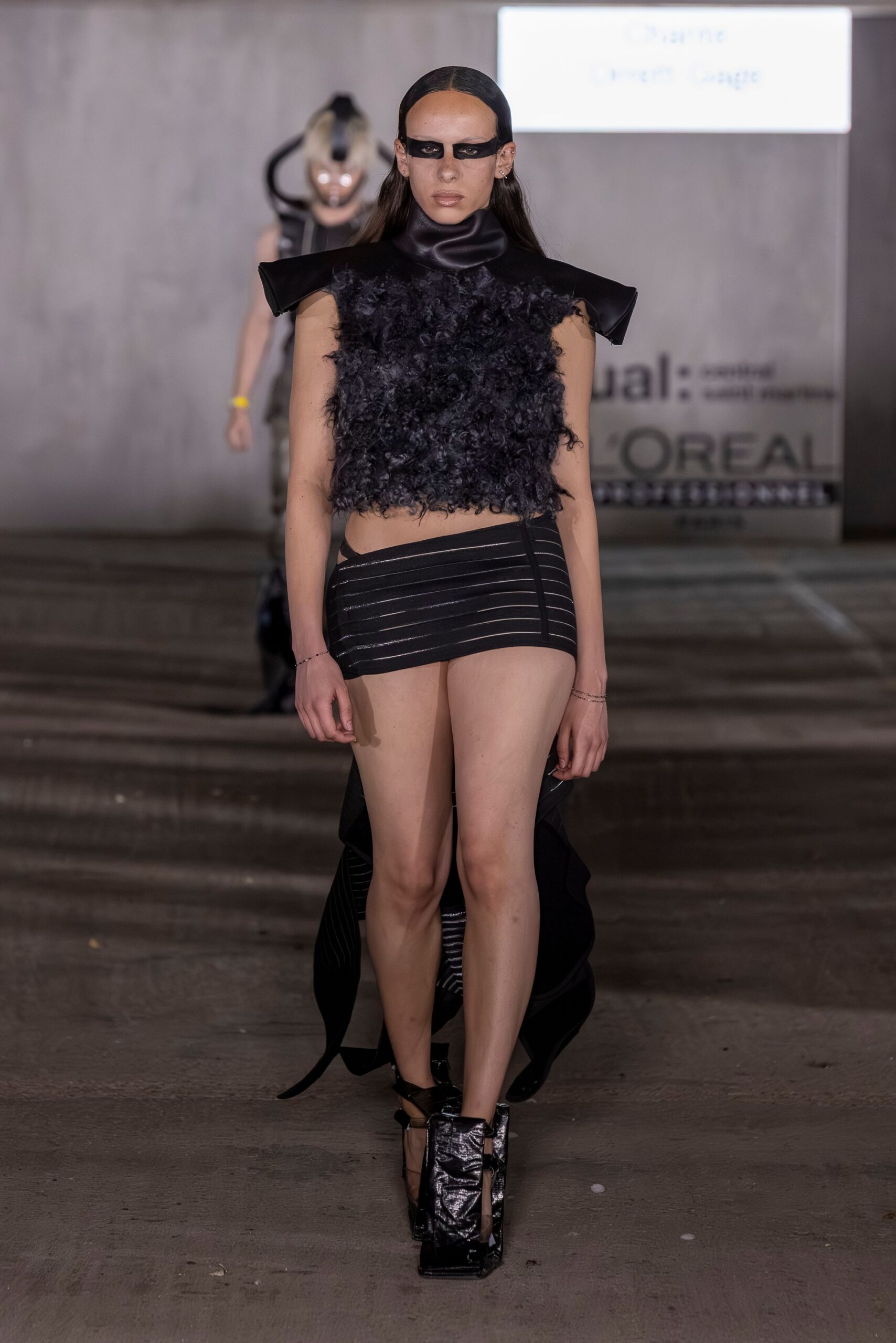 black feather sleeveless high-neck fitted ruffled top