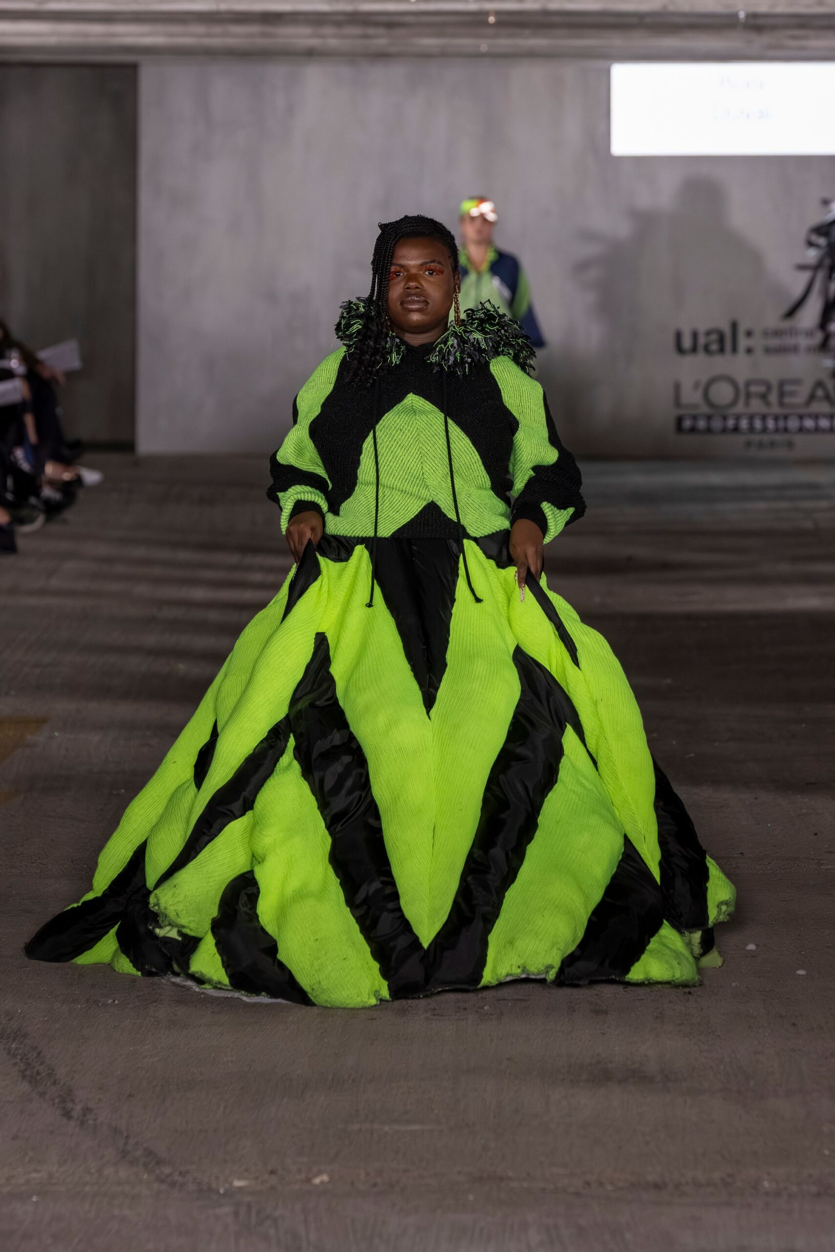 green and black pleated gown