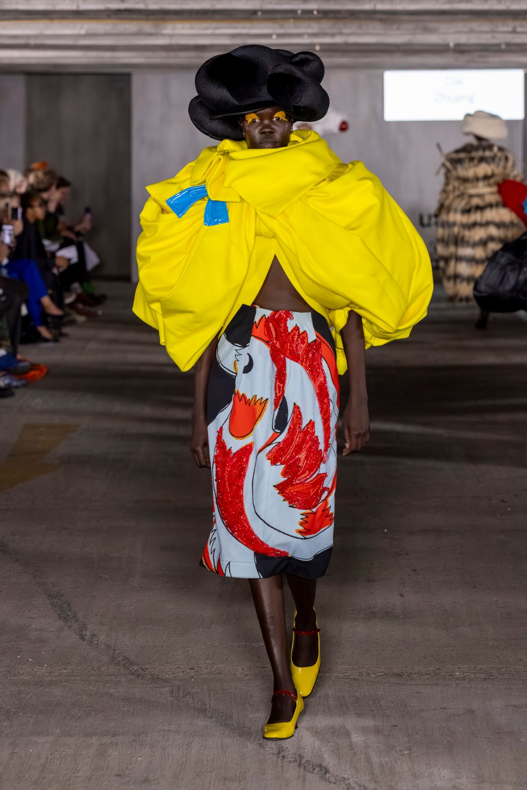 yellow sleeveless oversized draped top