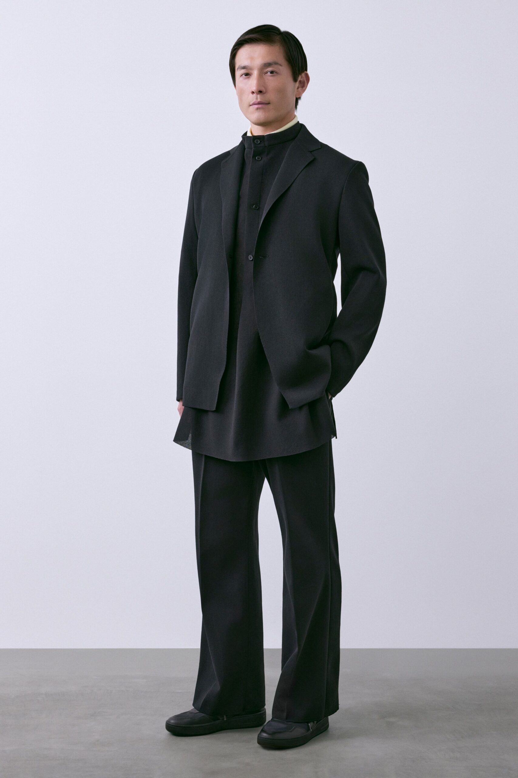 black wool long-sleeve collared structured buttoned suit