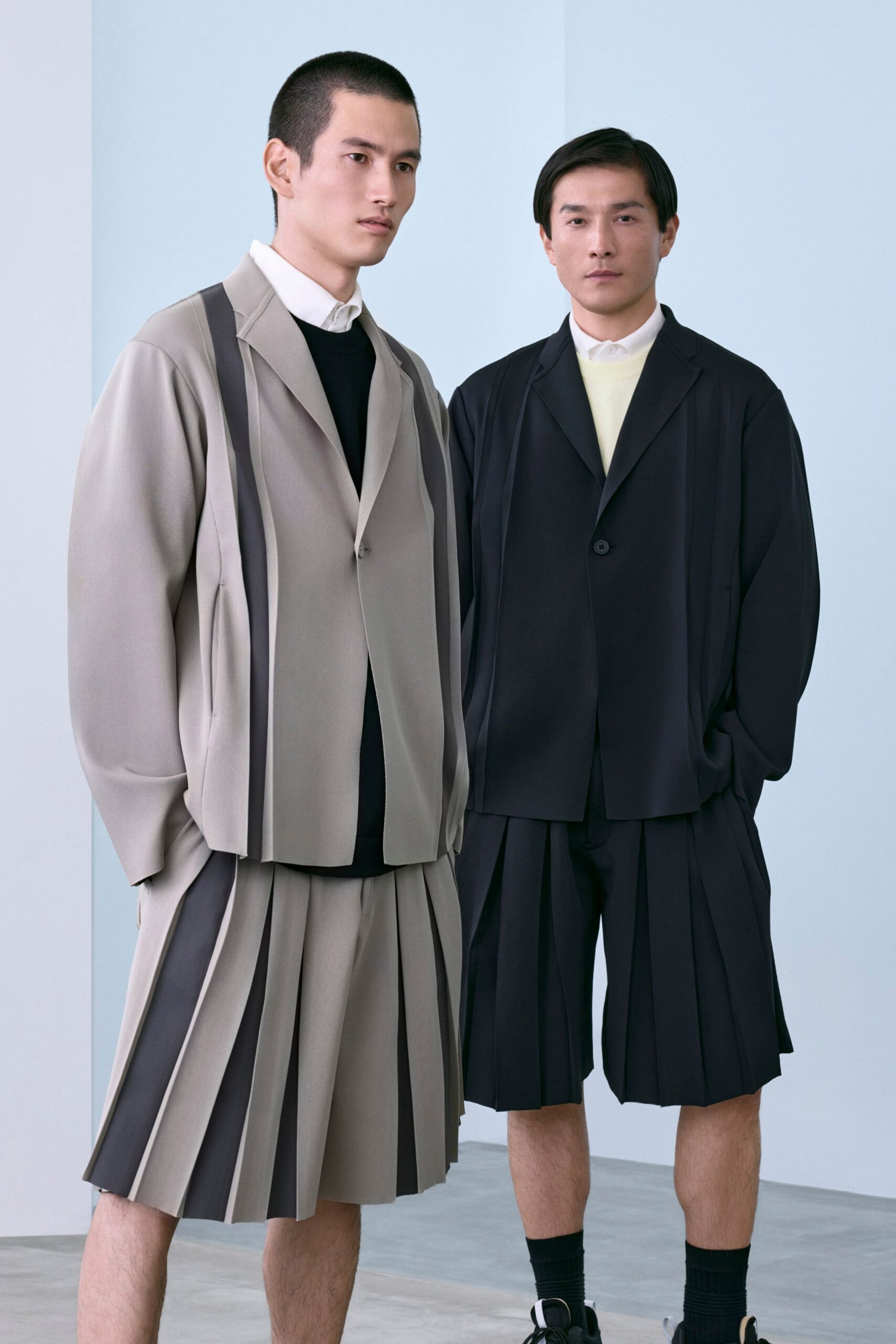 black cotton long-sleeve collared structured buttoned blazer