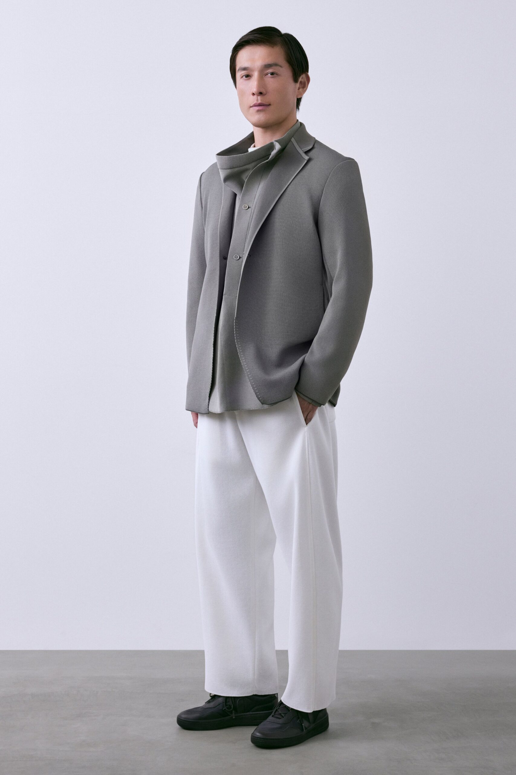 gray blazer white pants black shoes