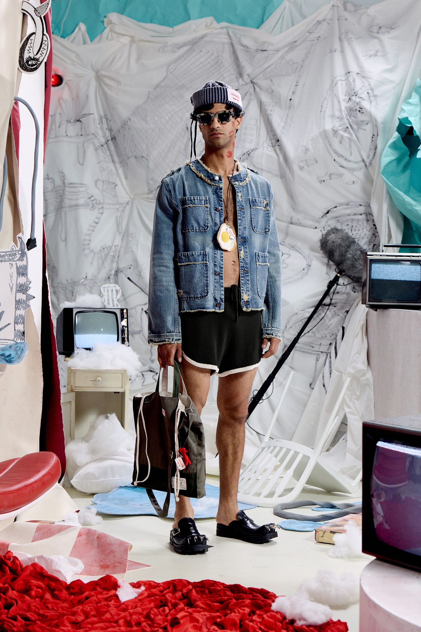 denim jacket with black shorts