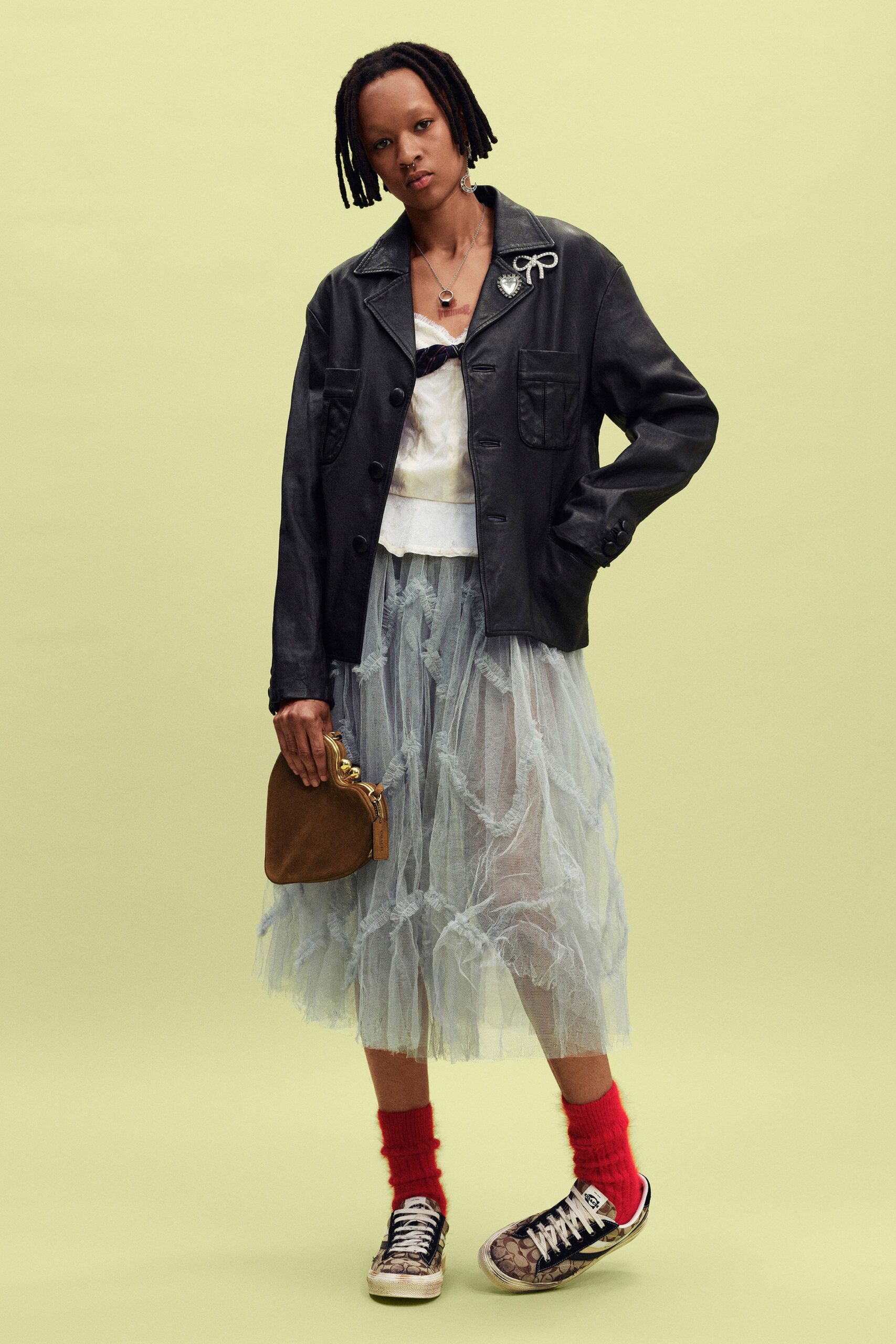 black leather long-sleeve collared relaxed buttoned jacket