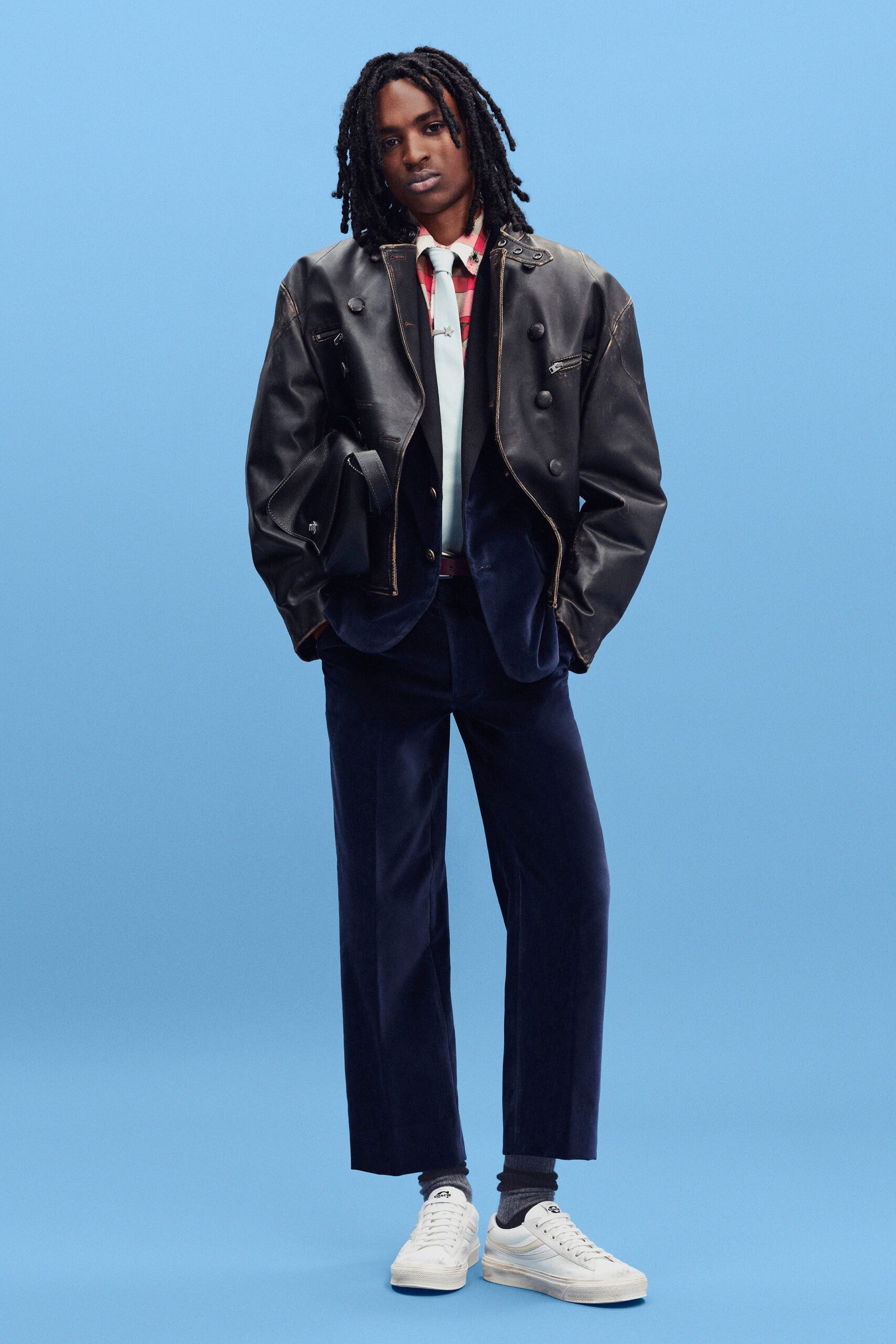 black leather long-sleeve collared relaxed buttoned jacket