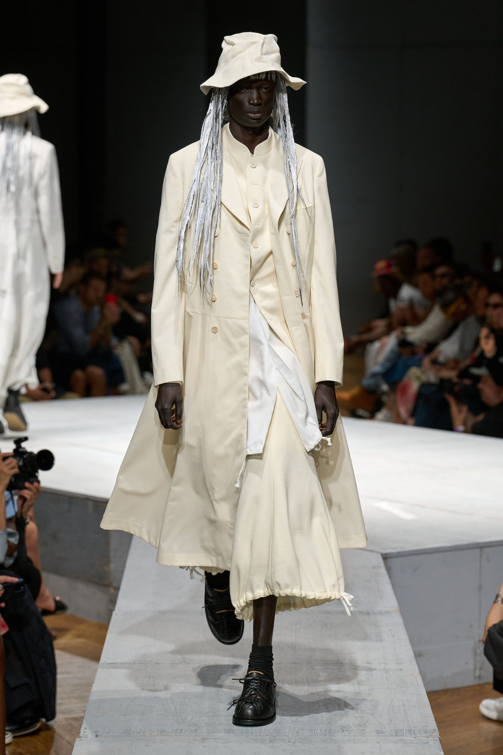 white coat and dress with hat