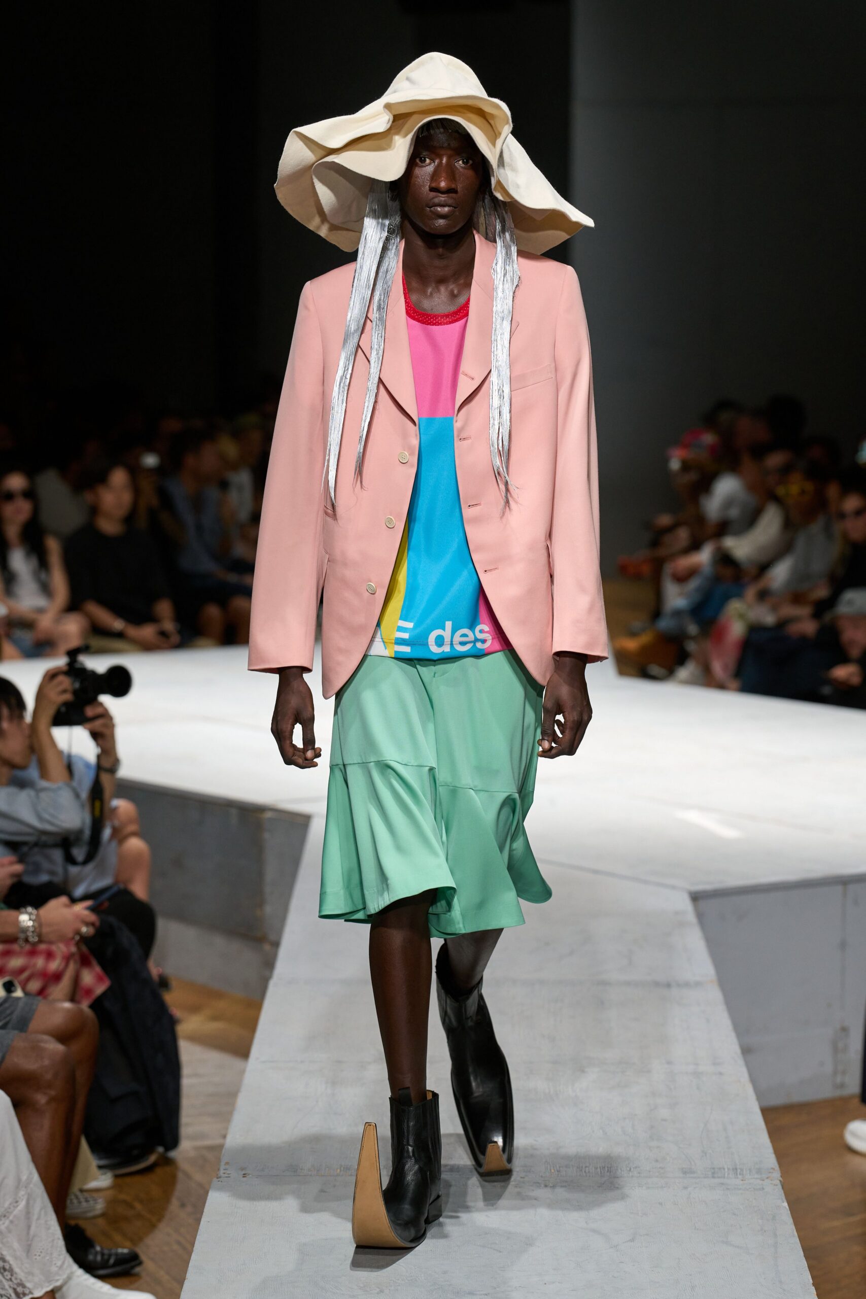 pink blazer with green skirt