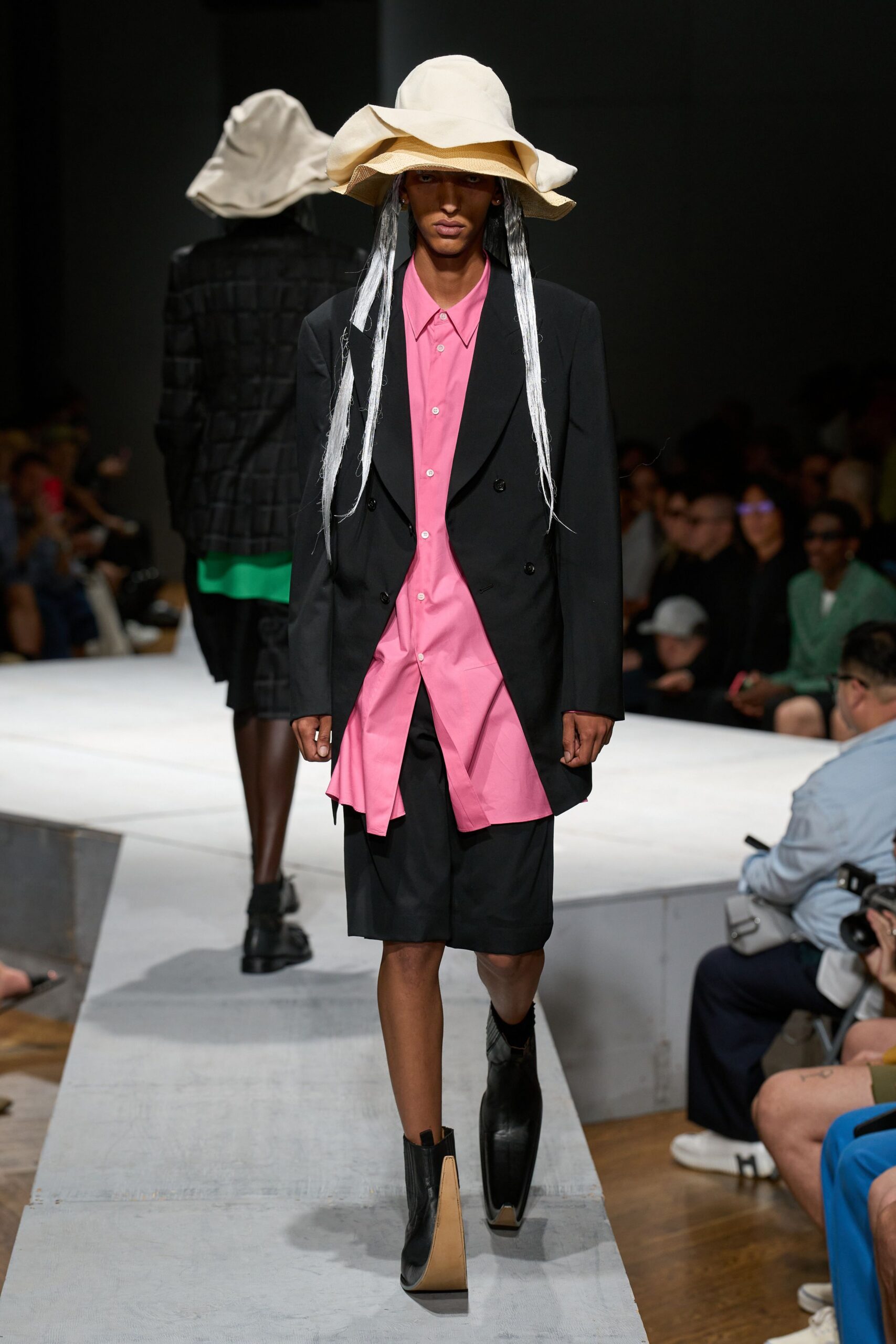 black blazer pink shirt black shorts