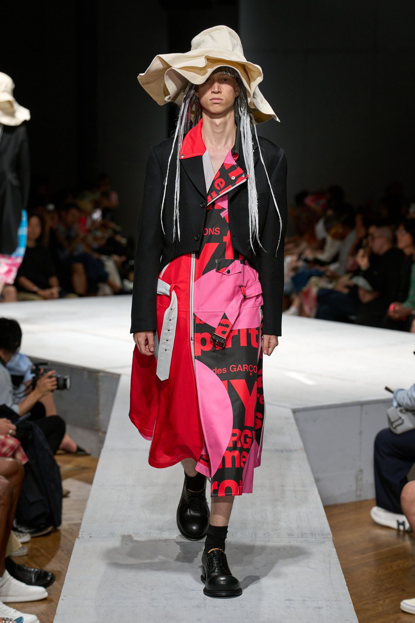 black coat pink red dress