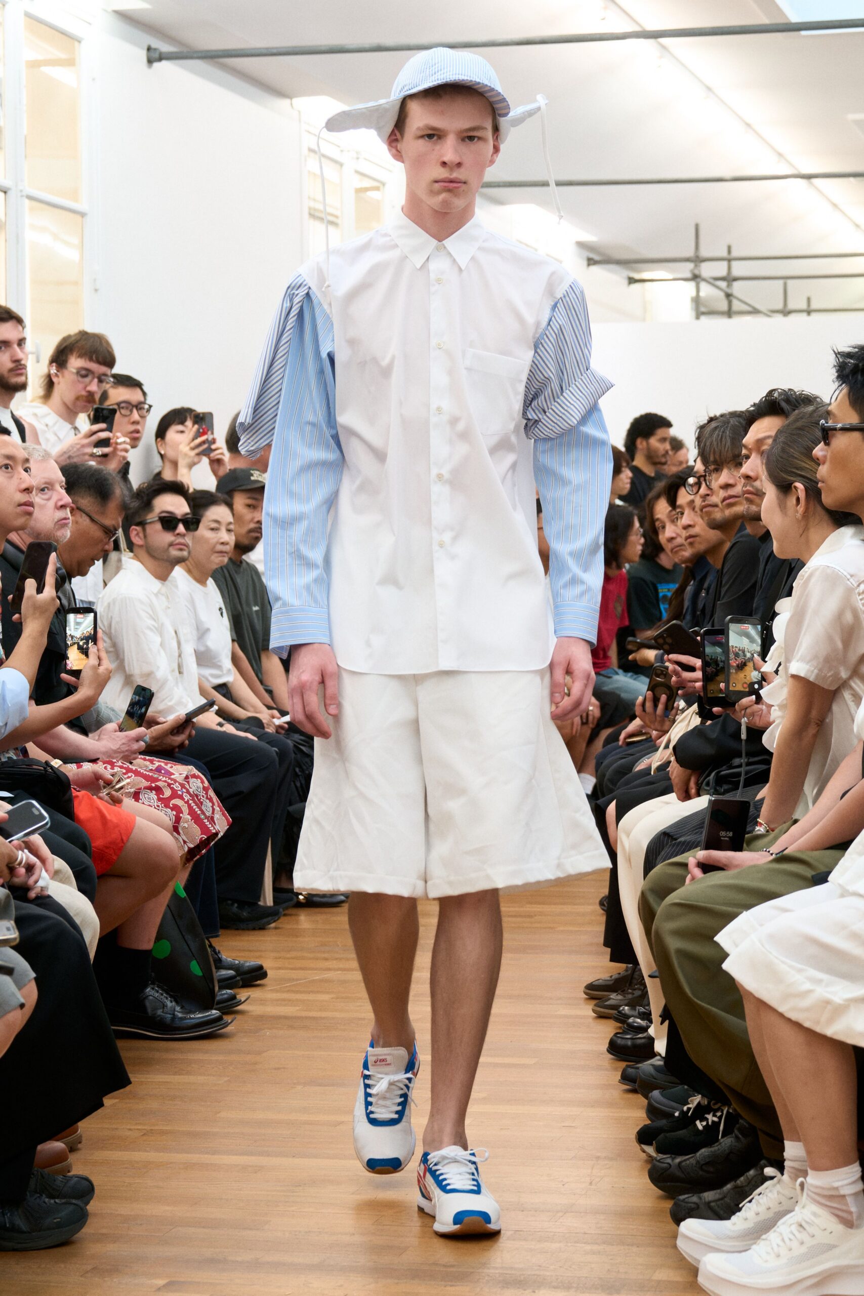 white cotton long-sleeve collared relaxed buttoned shirt