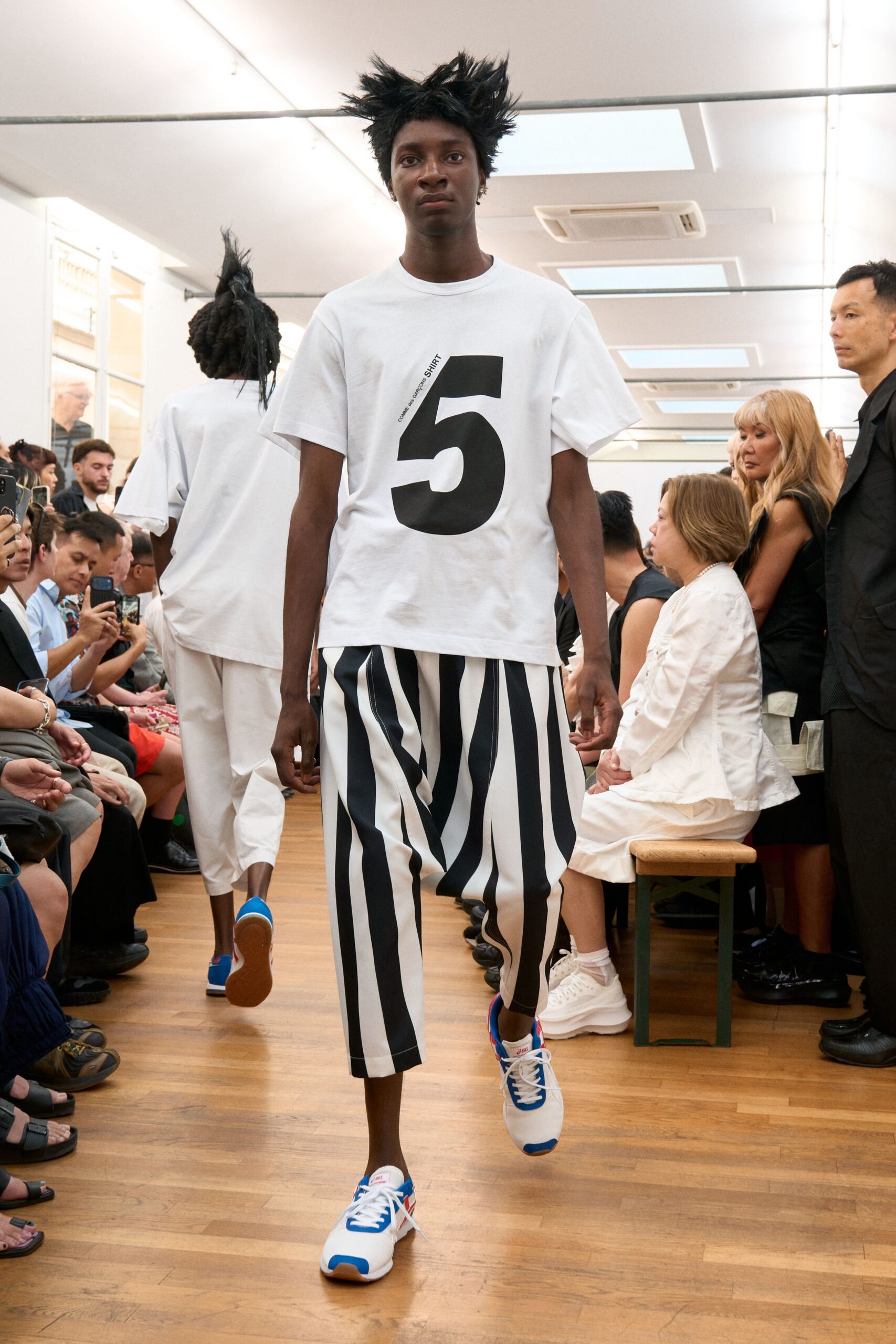 white t-shirt black and white striped pants