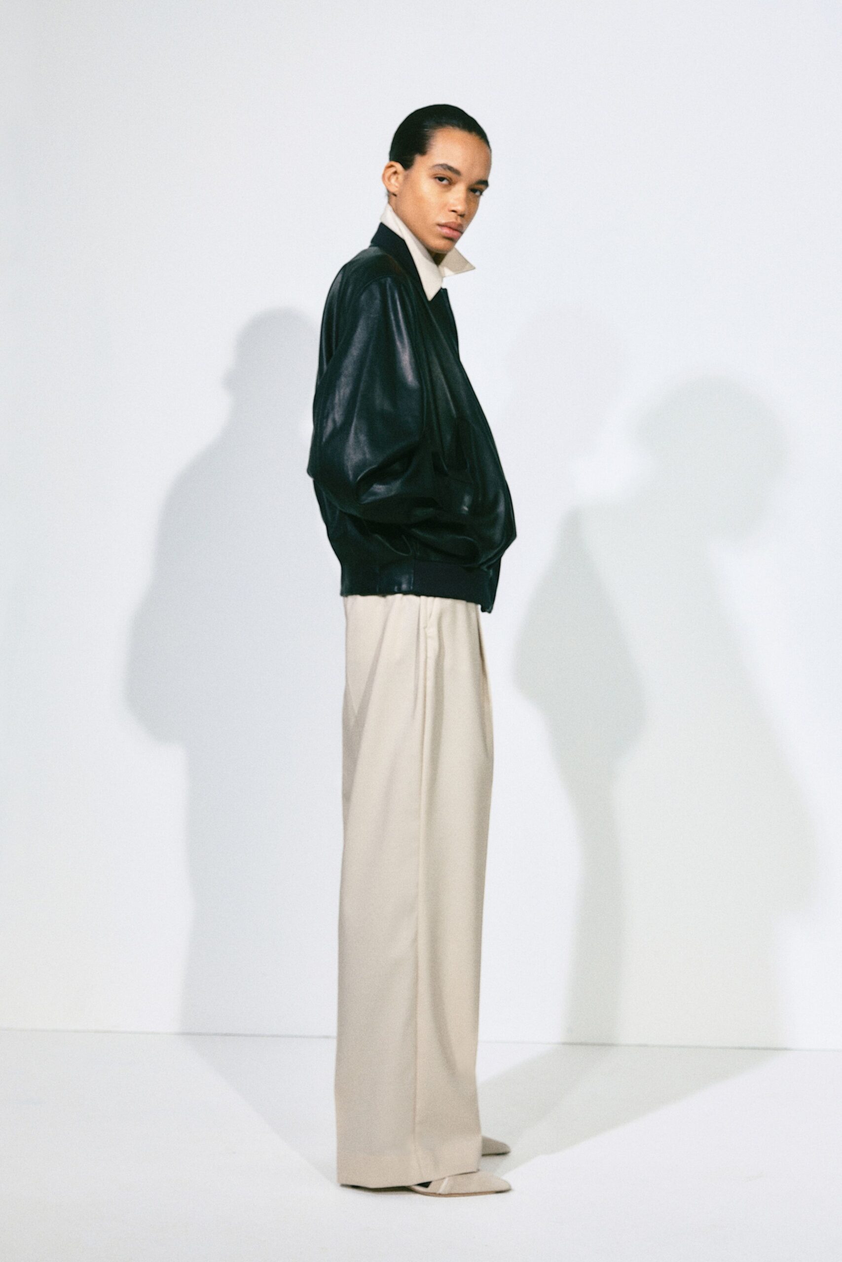 black leather long-sleeve collared relaxed jacket