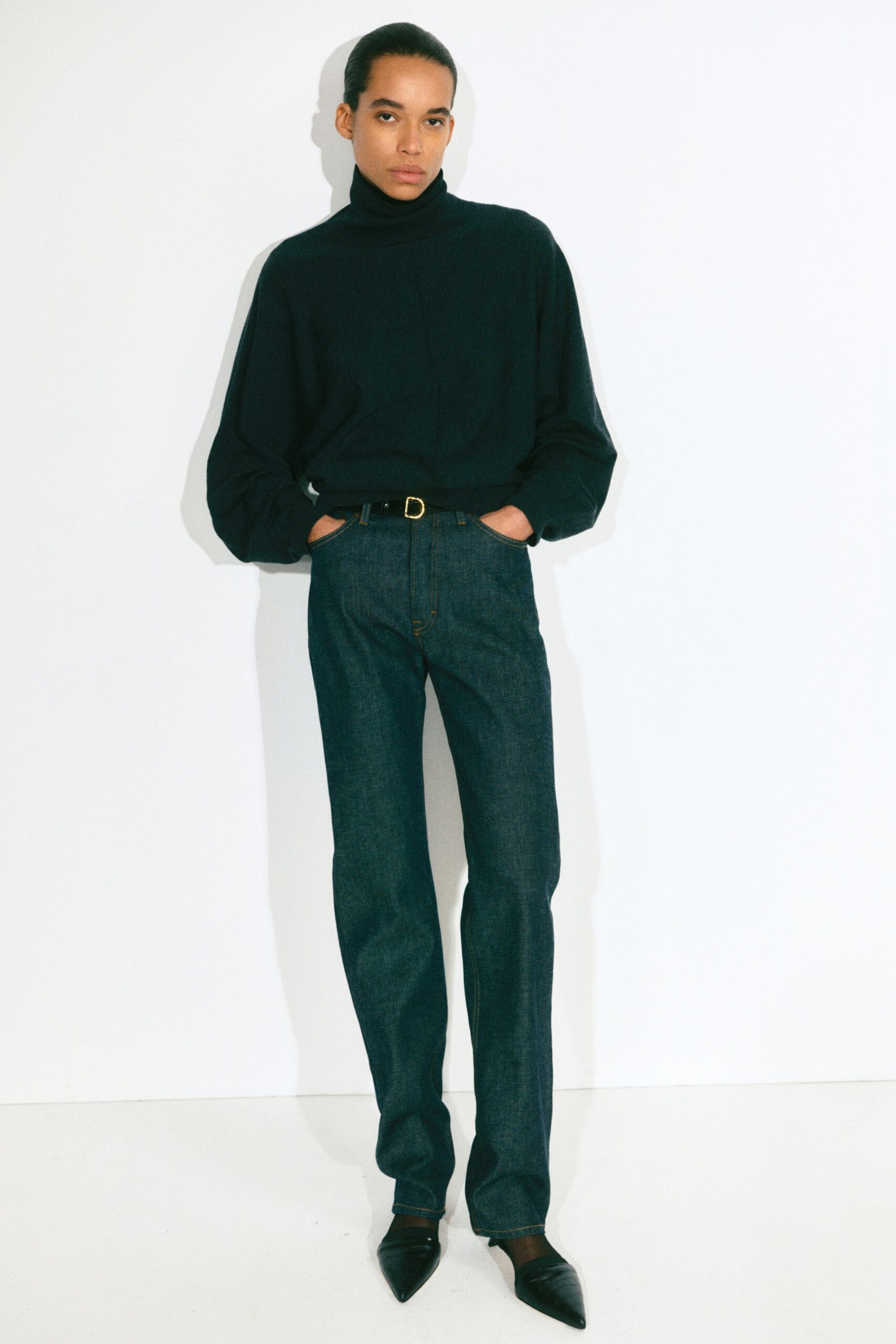 black wool relaxed top with denim pants