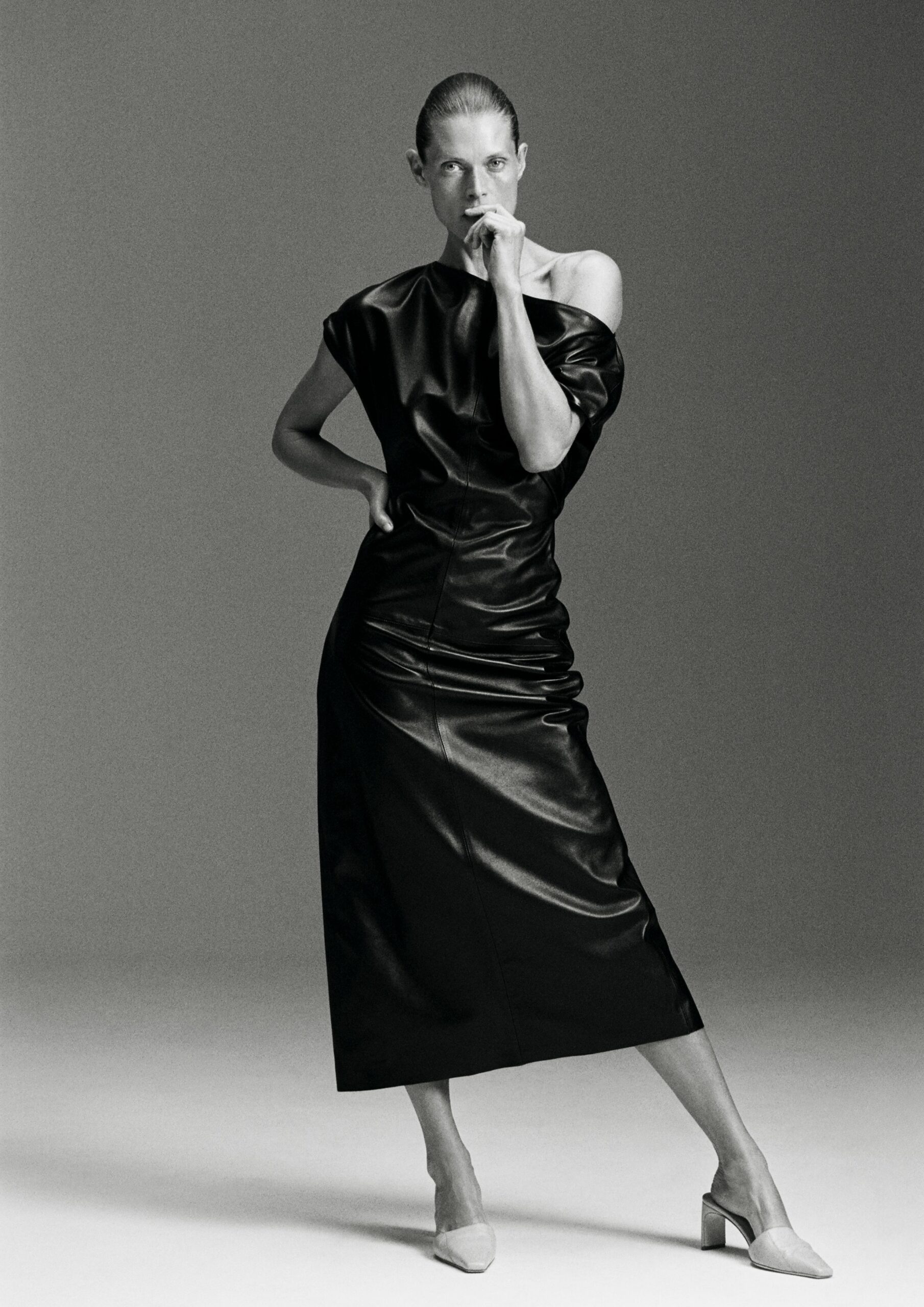 black leather sleeveless off-shoulder fitted ruched midi dress