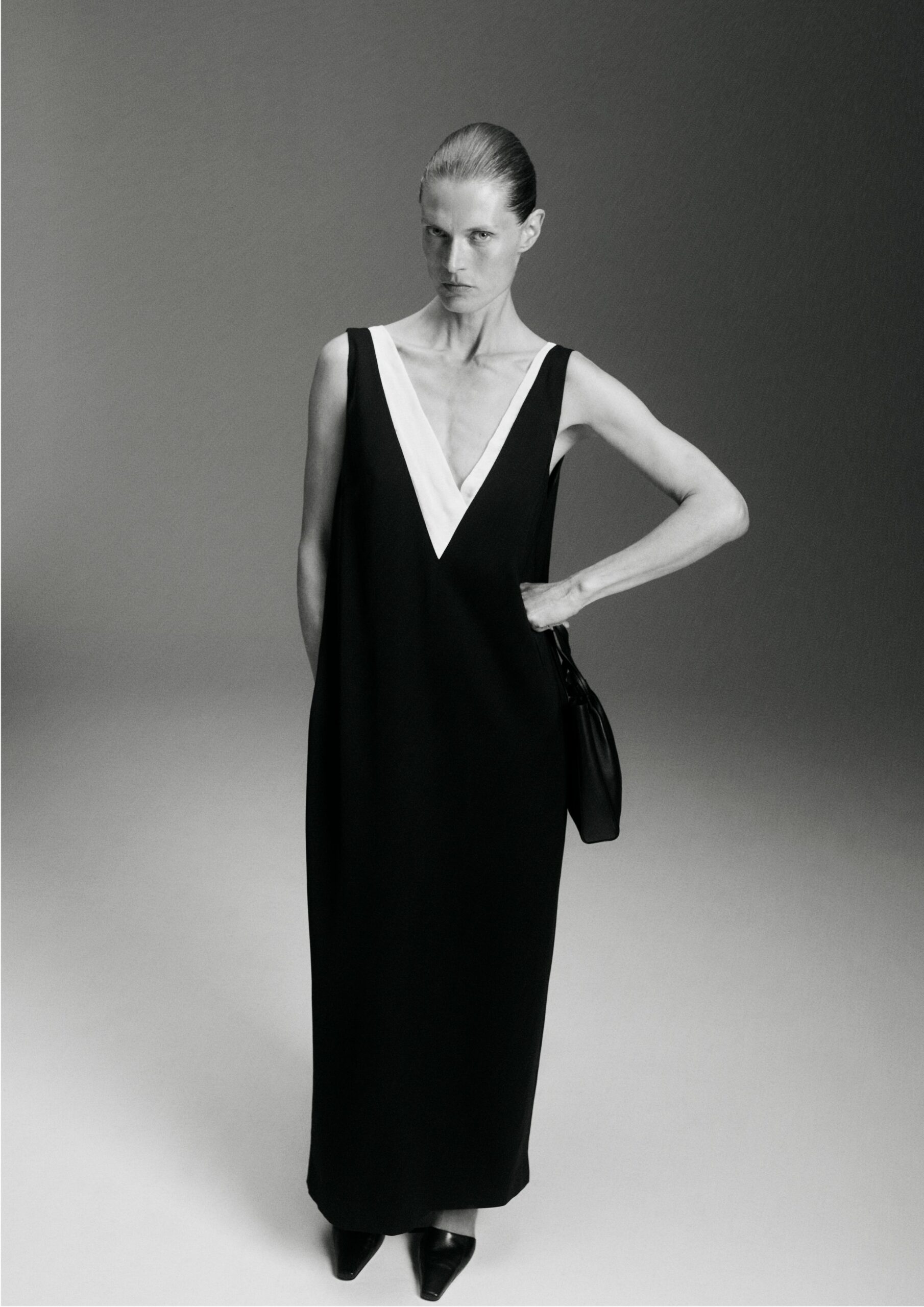 black silk sleeveless v-neck fitted maxi gown