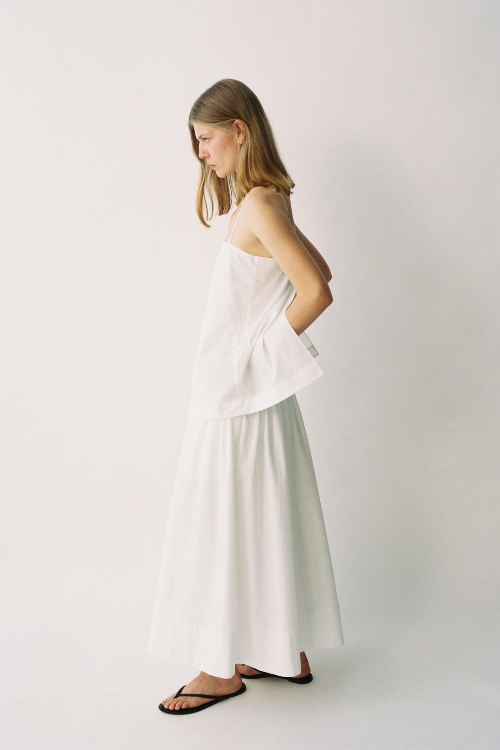 white cotton sleeveless asymmetric relaxed top