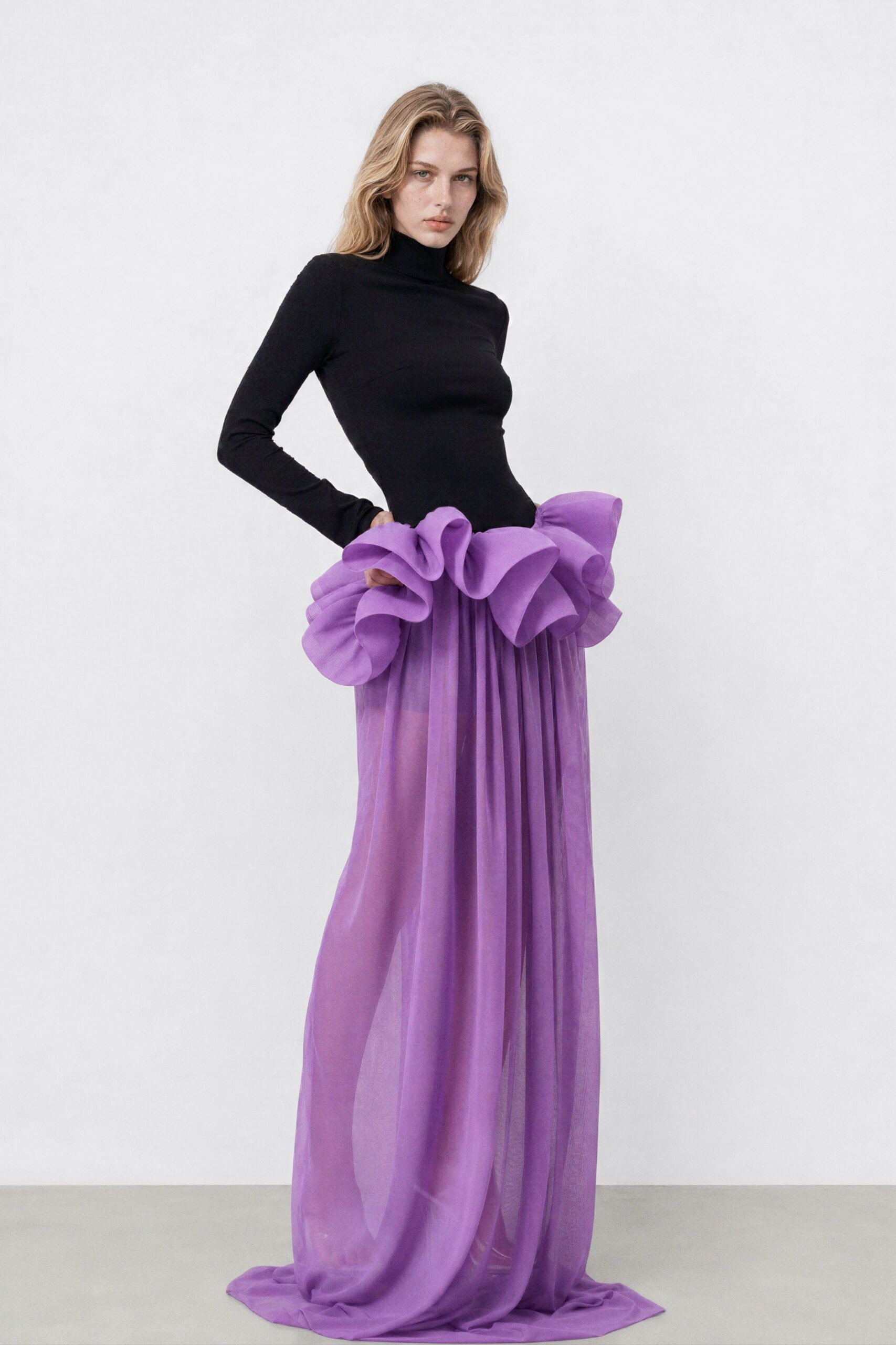 black fitted top with purple skirt