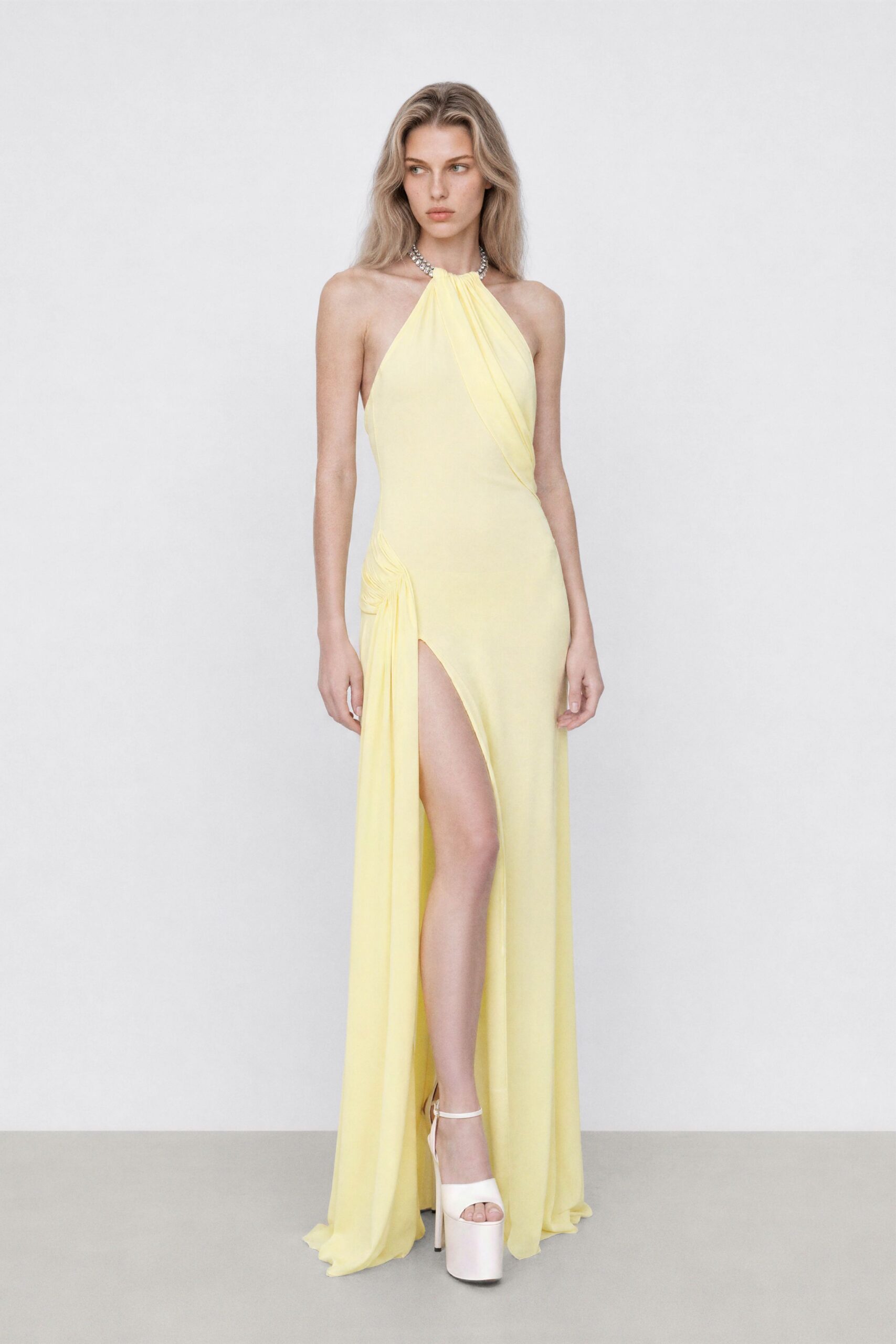 yellow silk sleeveless halter fitted ruched flowing gown