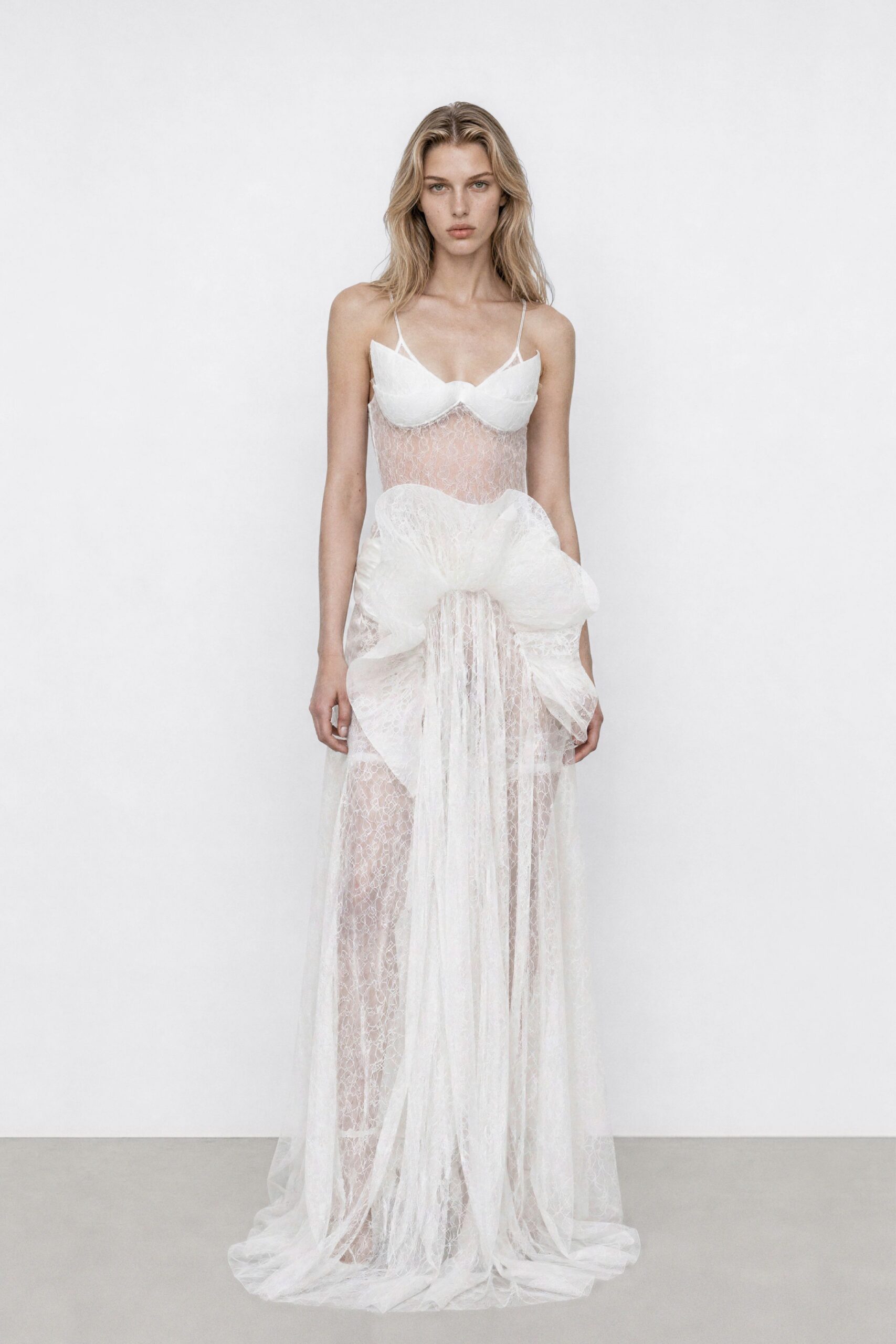 white lace sleeveless gown