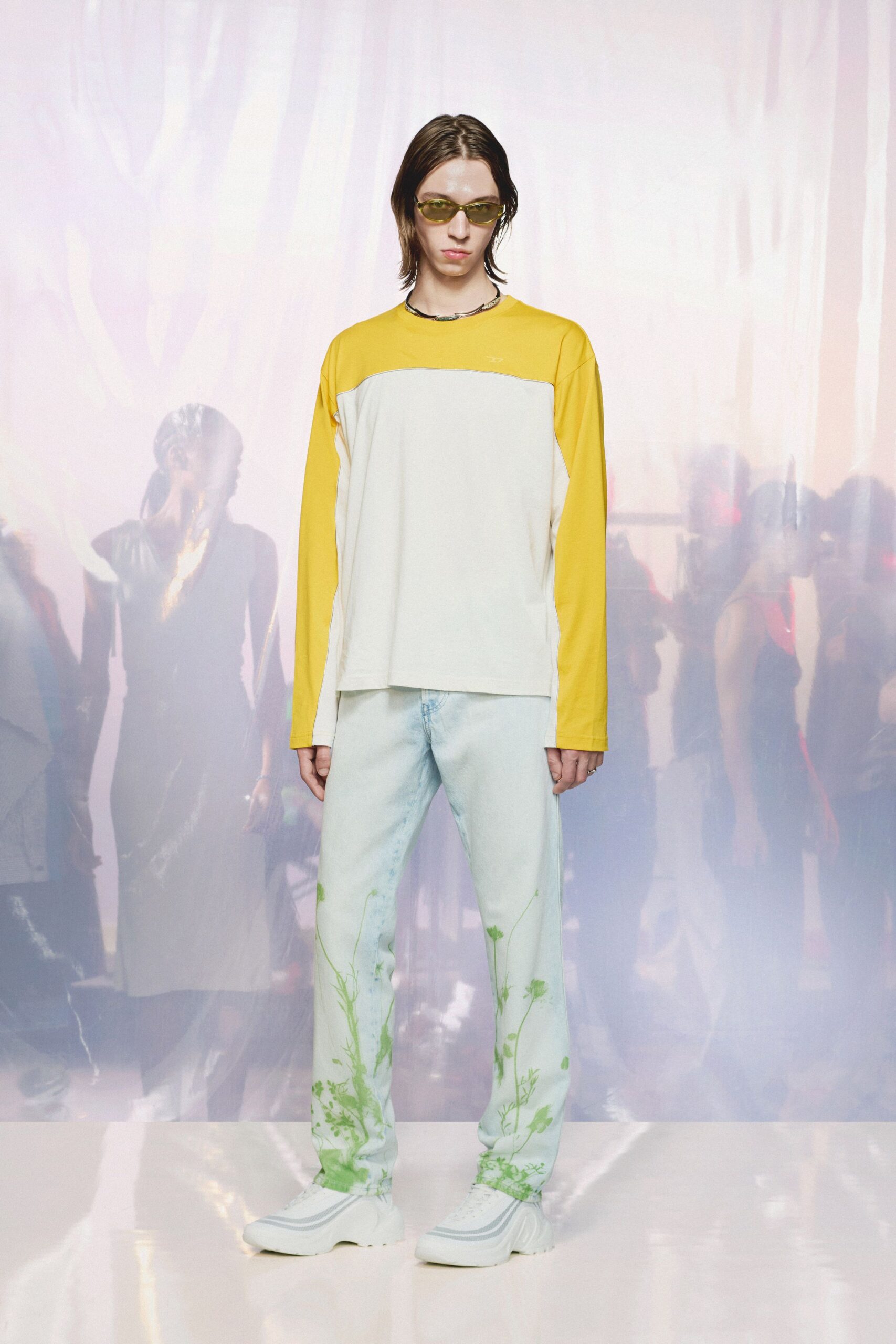 relaxed white yellow top with printed blue pants