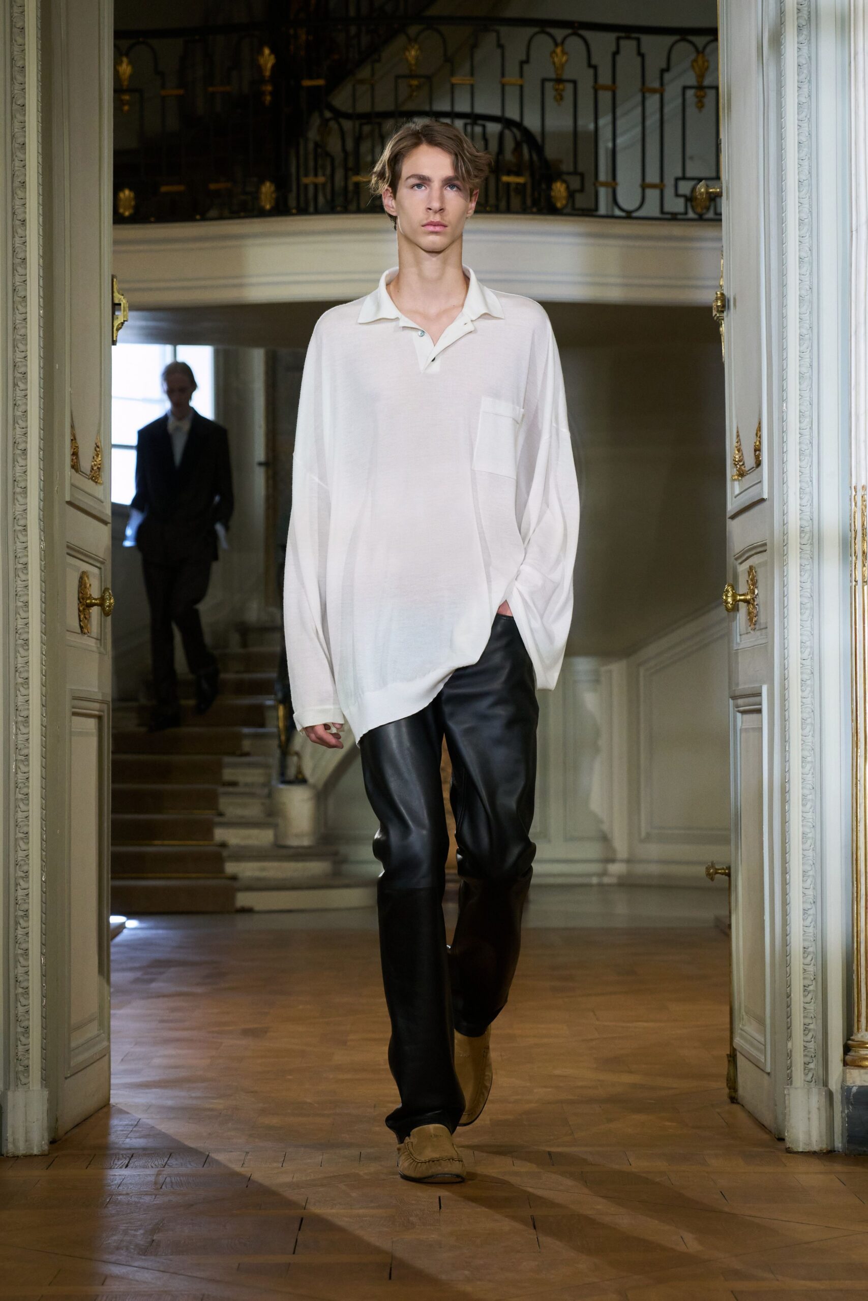 white oversized shirt black leather pants