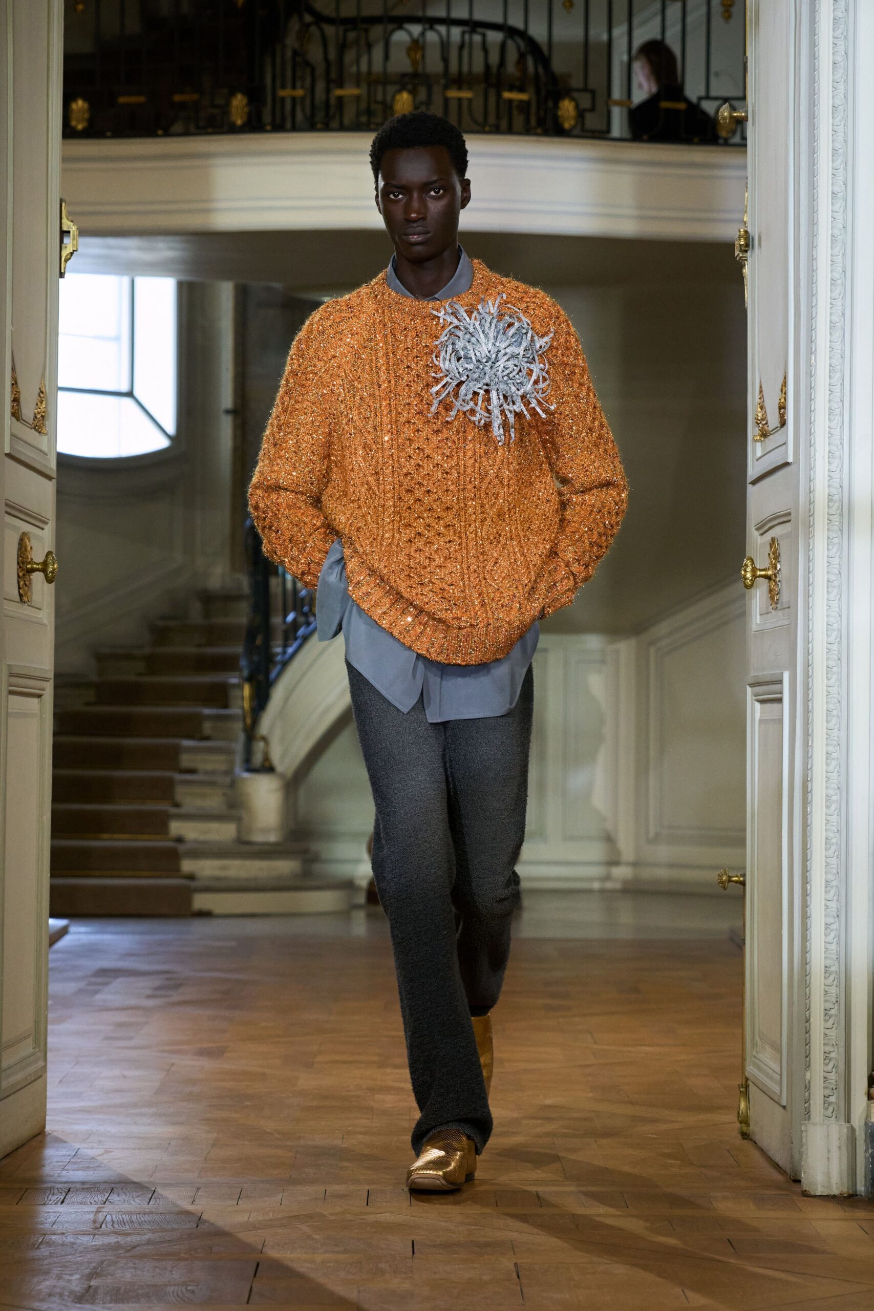 orange knitted sweater with blue shirt