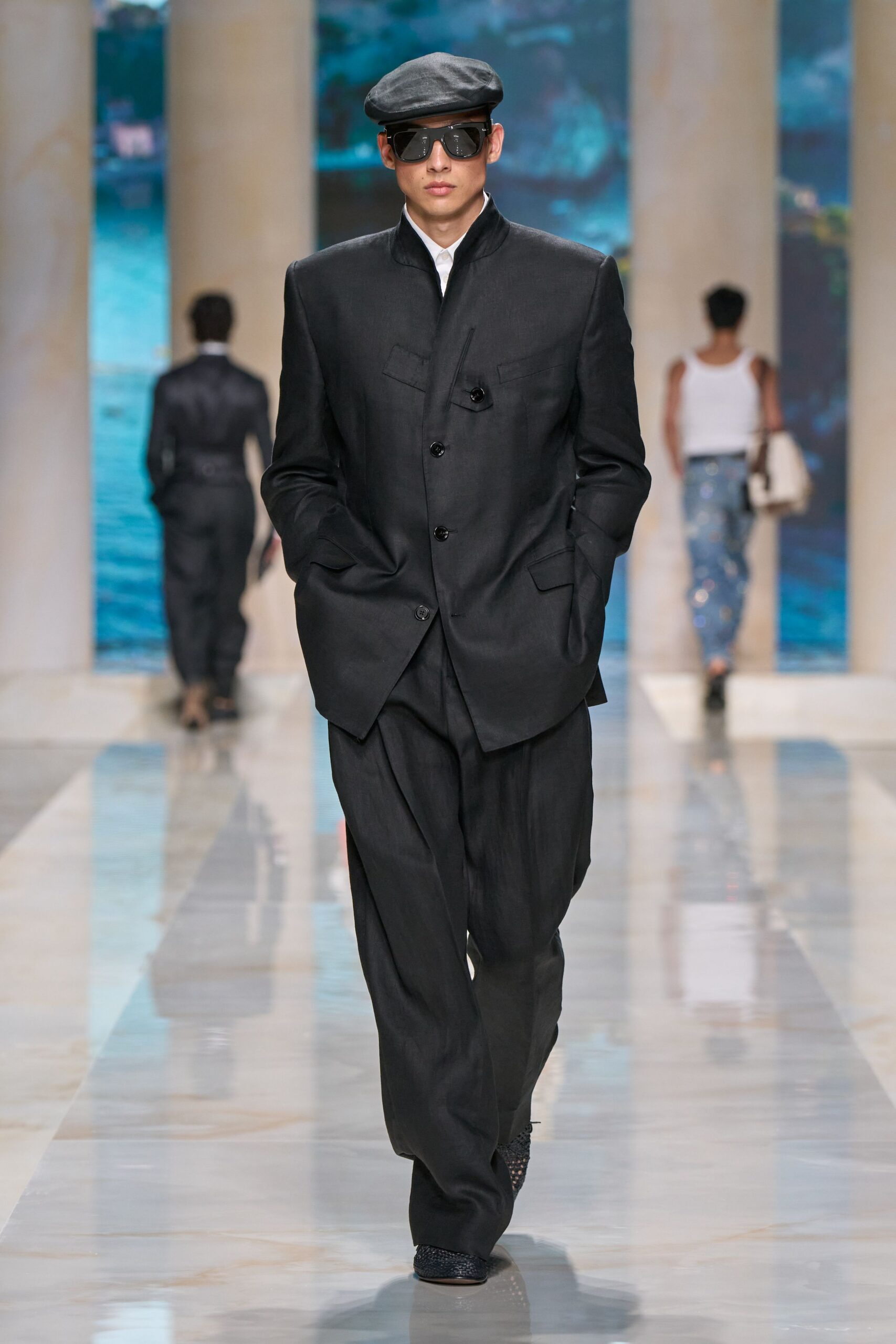 black cotton long-sleeve collared relaxed buttoned suit