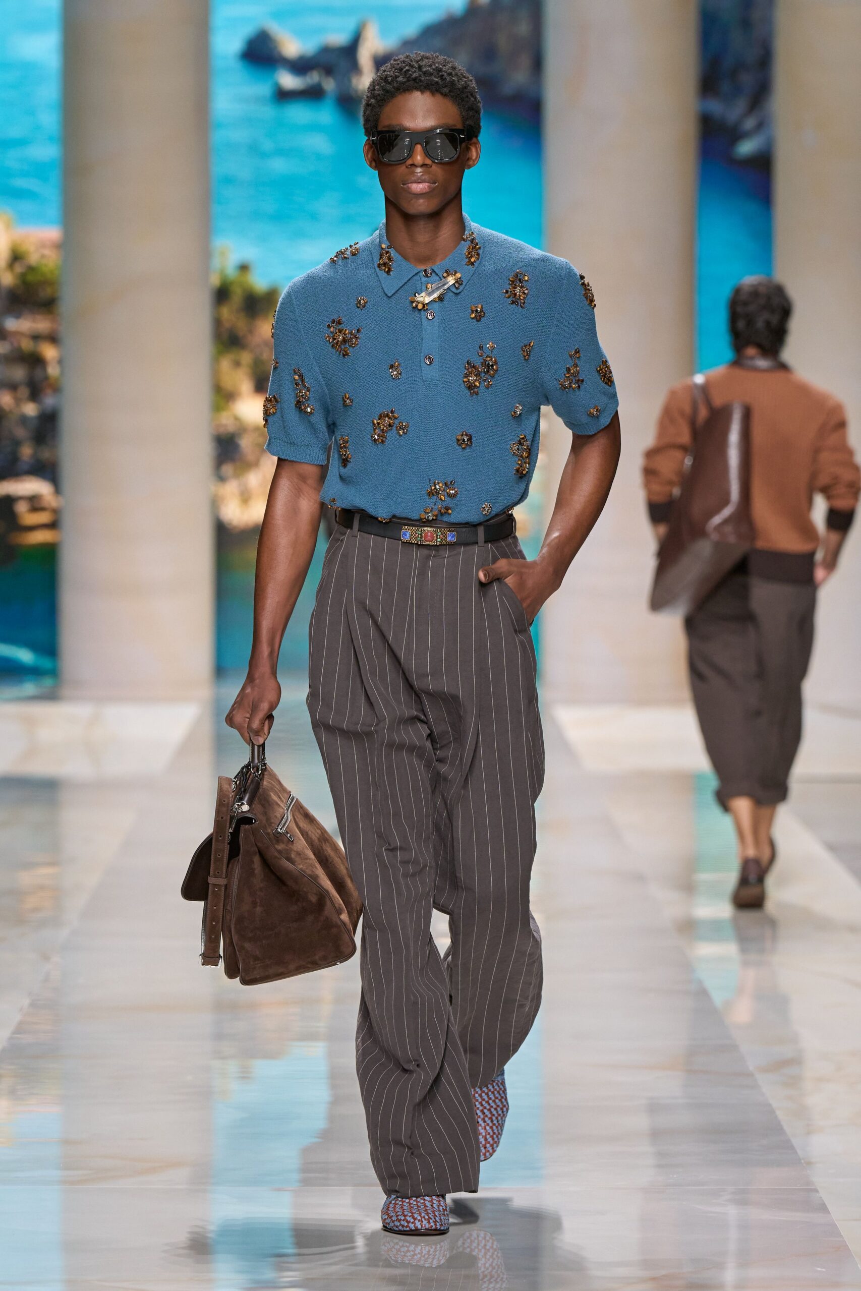 blue printed shirt with gray pants