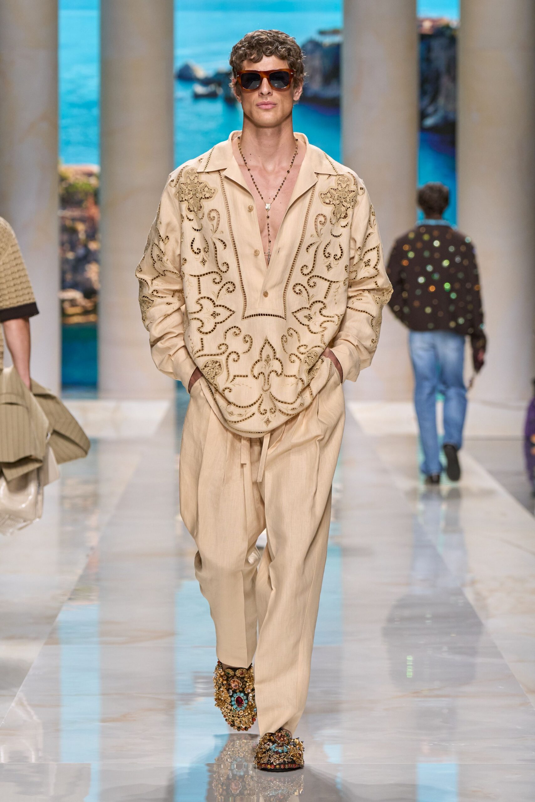 beige embroidered shirt and pants