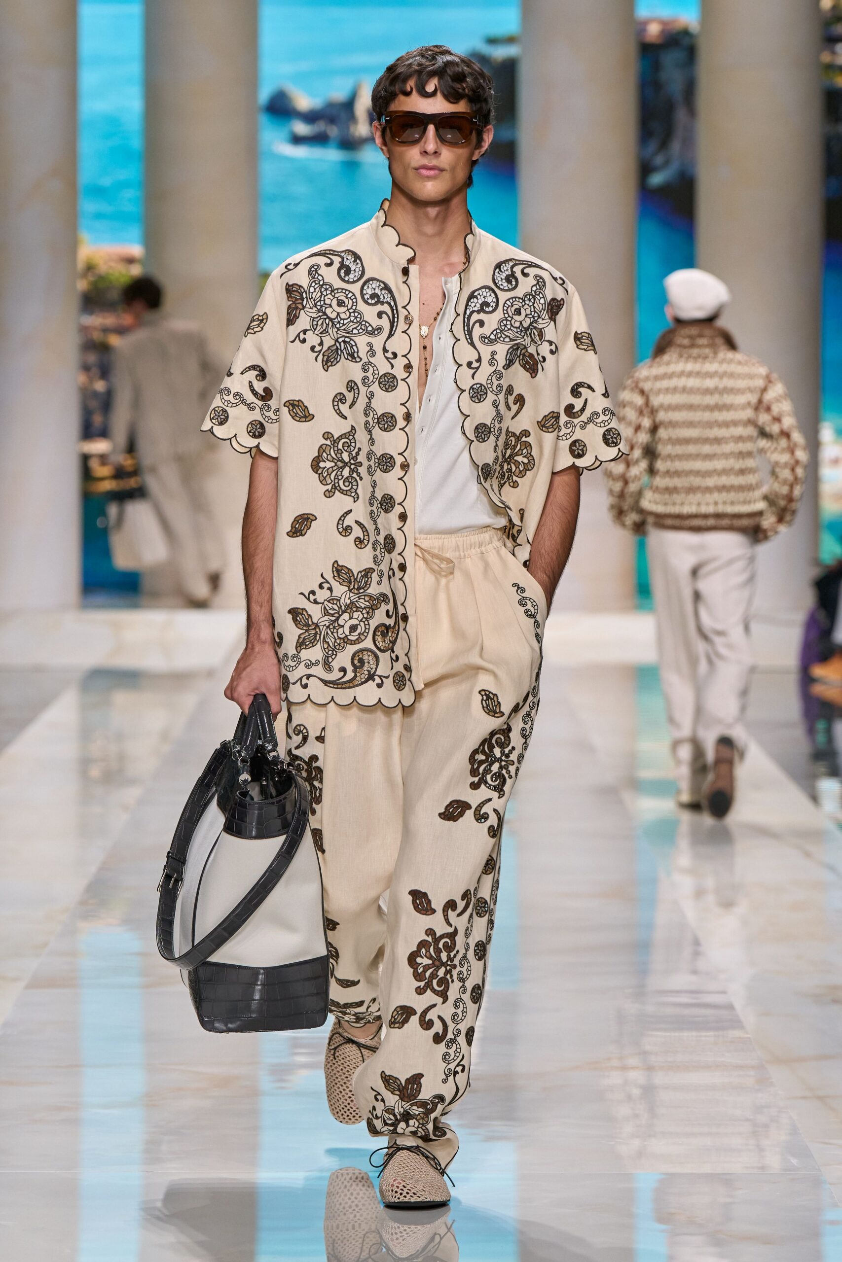 beige embroidered shirt and pants