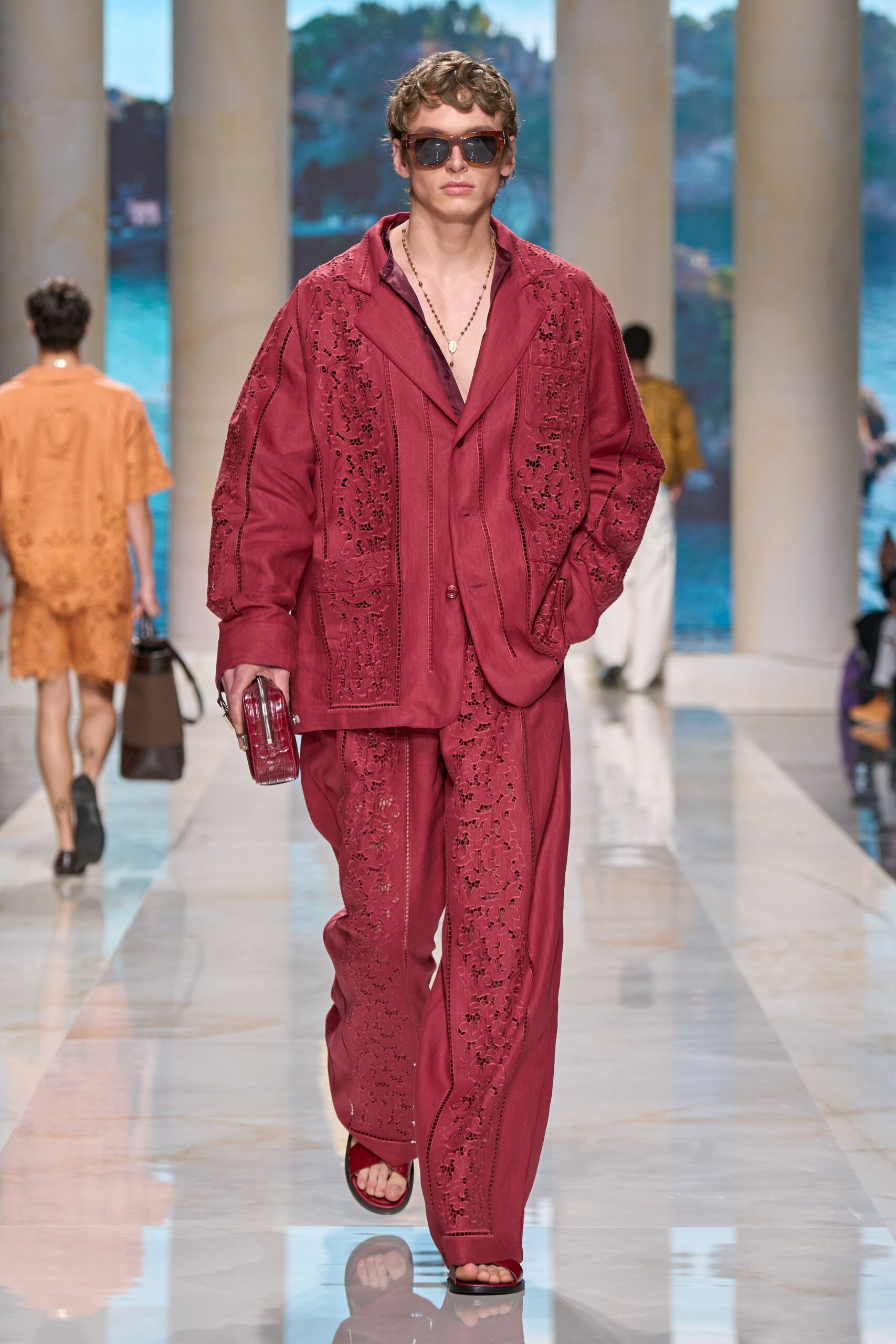 red embroidered suit with accessories