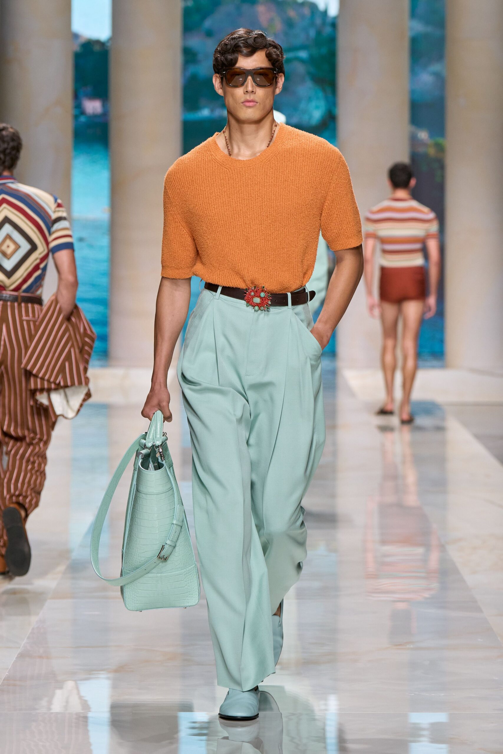 orange relaxed top with mint pants