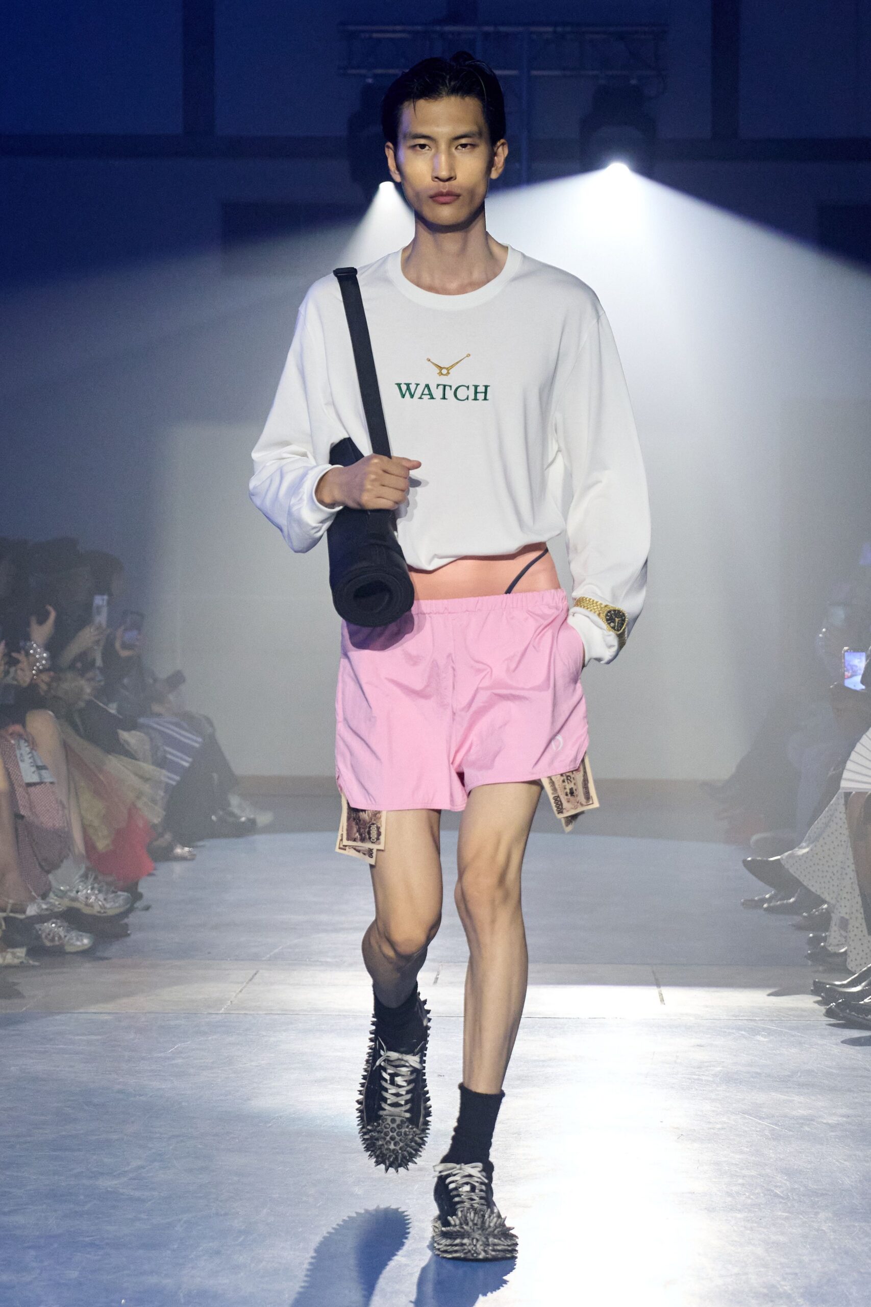 white relaxed shirt with pink shorts