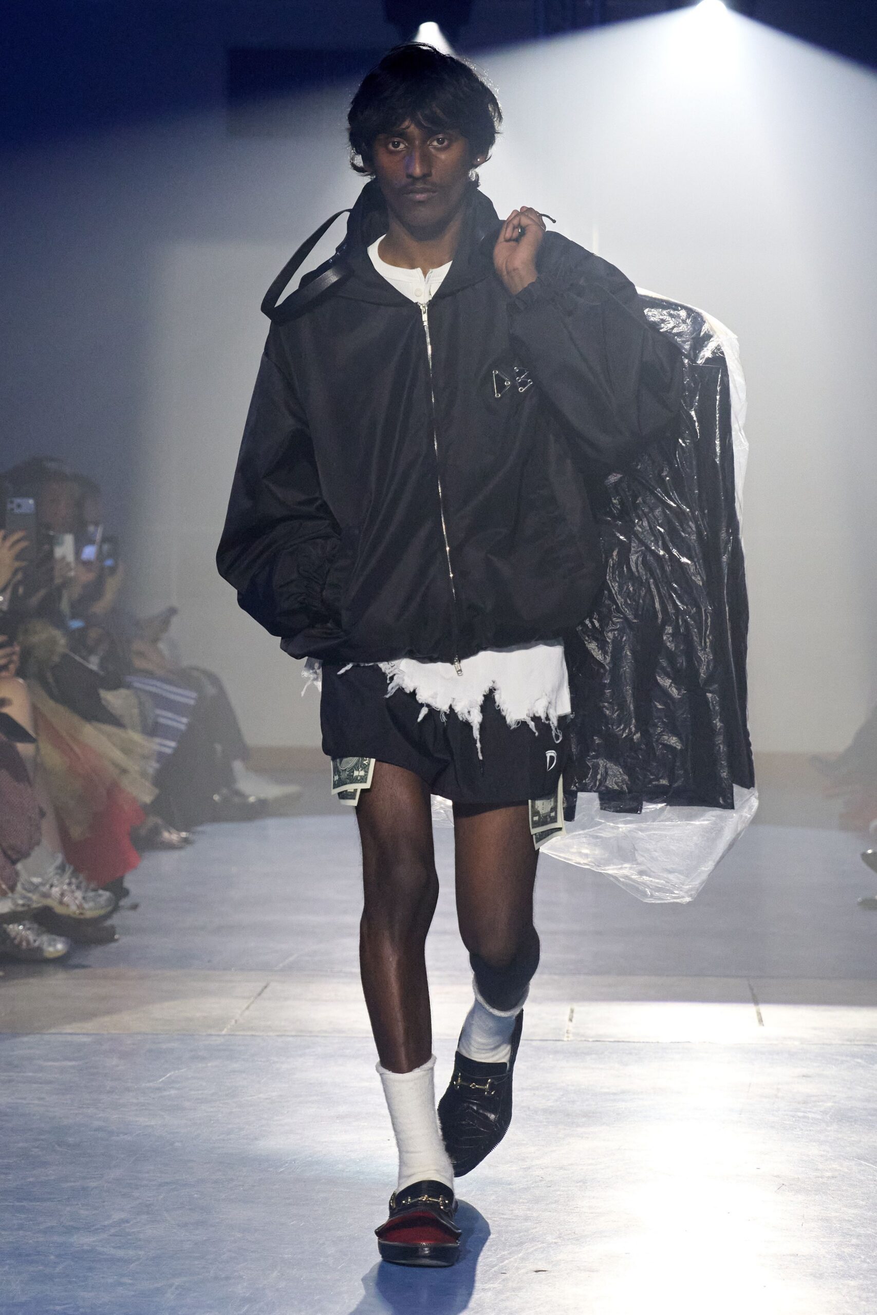 black oversized jacket with distressed shorts