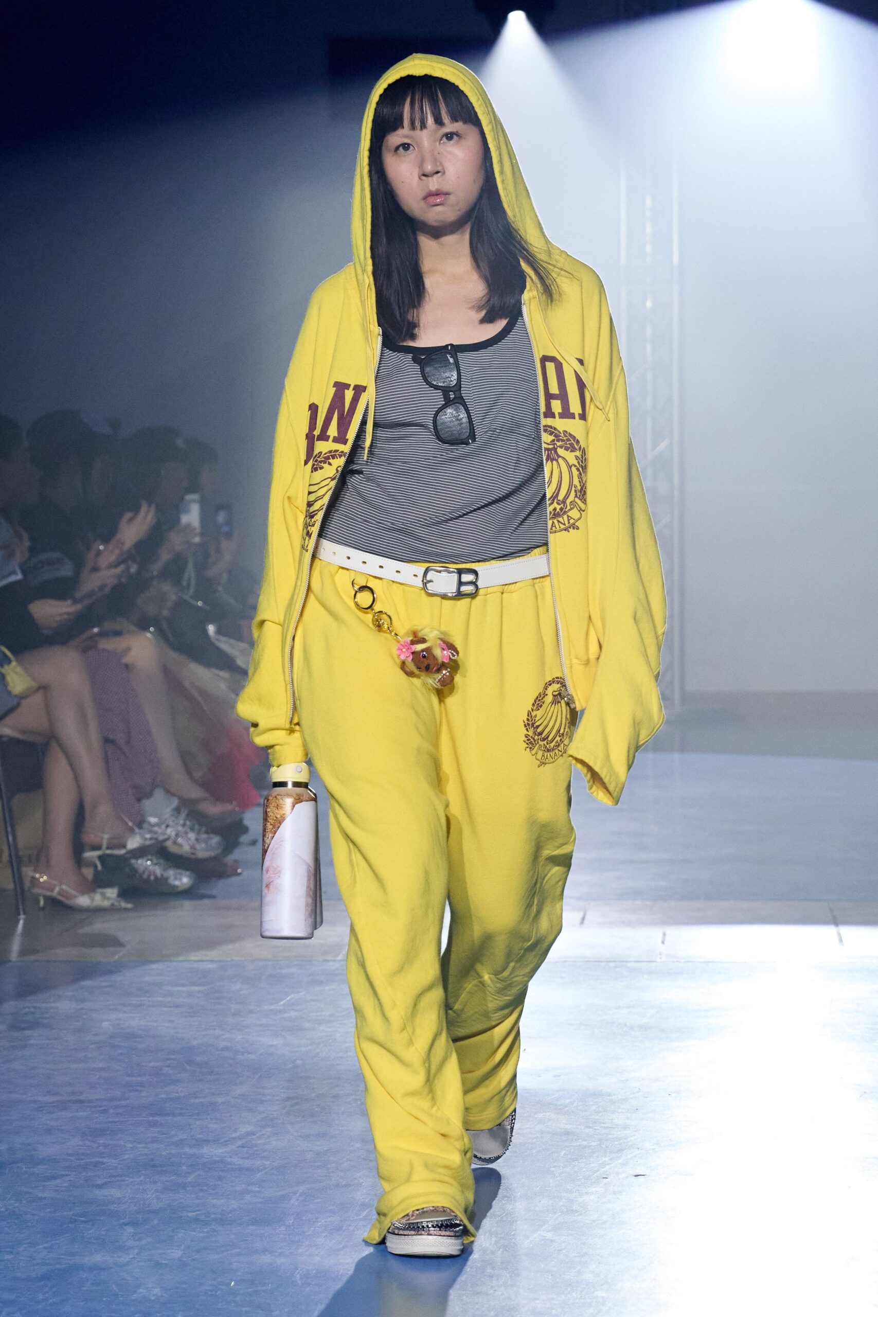 yellow hoodie gray tank-top relaxed pants