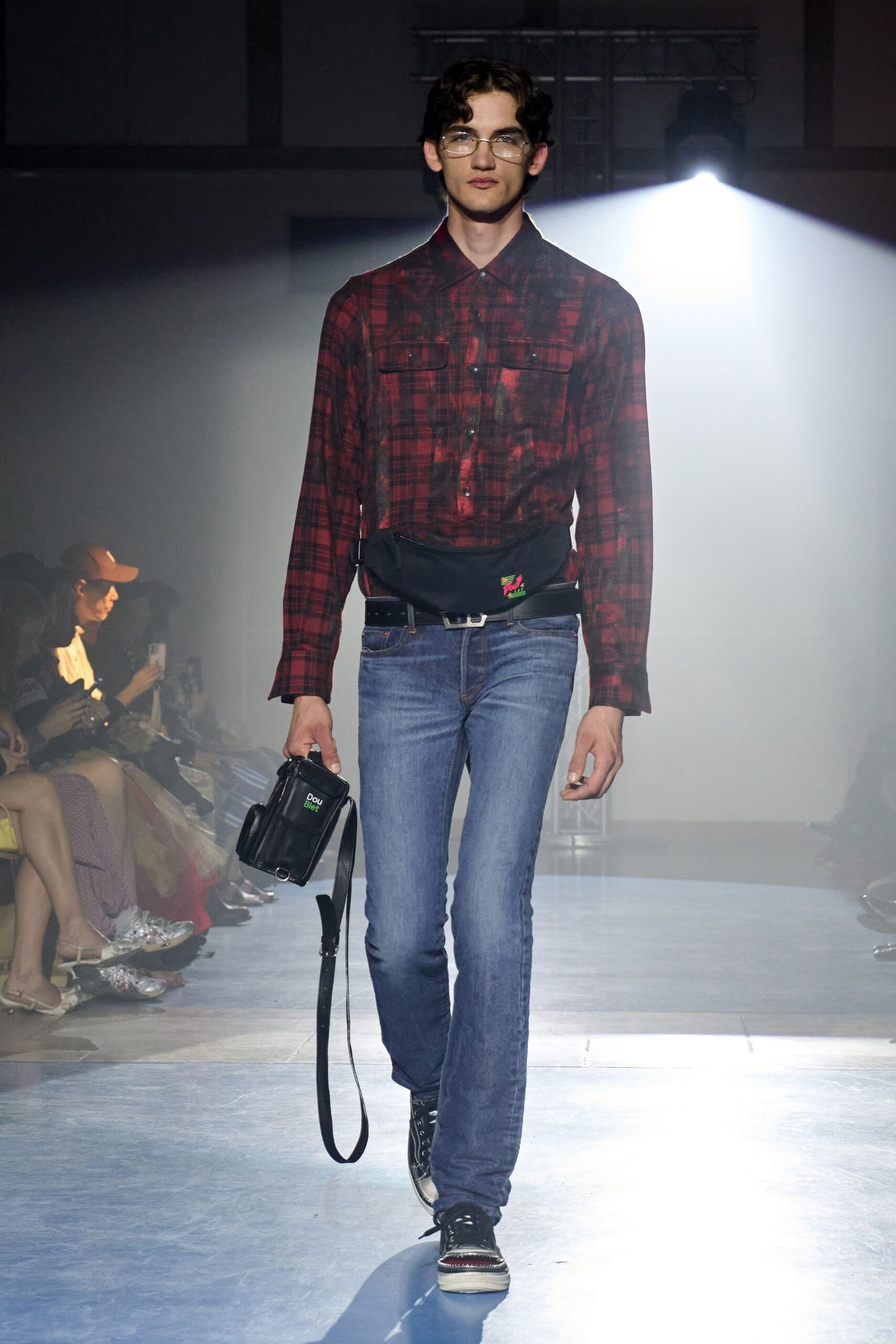 red and black checked shirt with denim pants