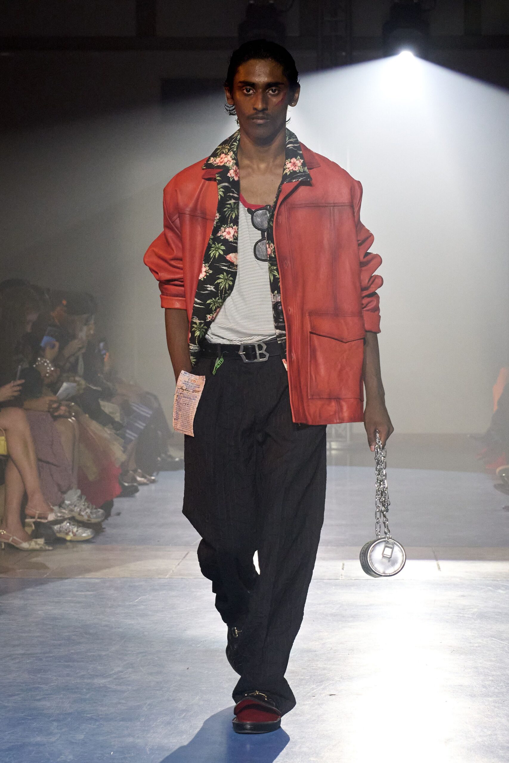 red leather jacket with black pants