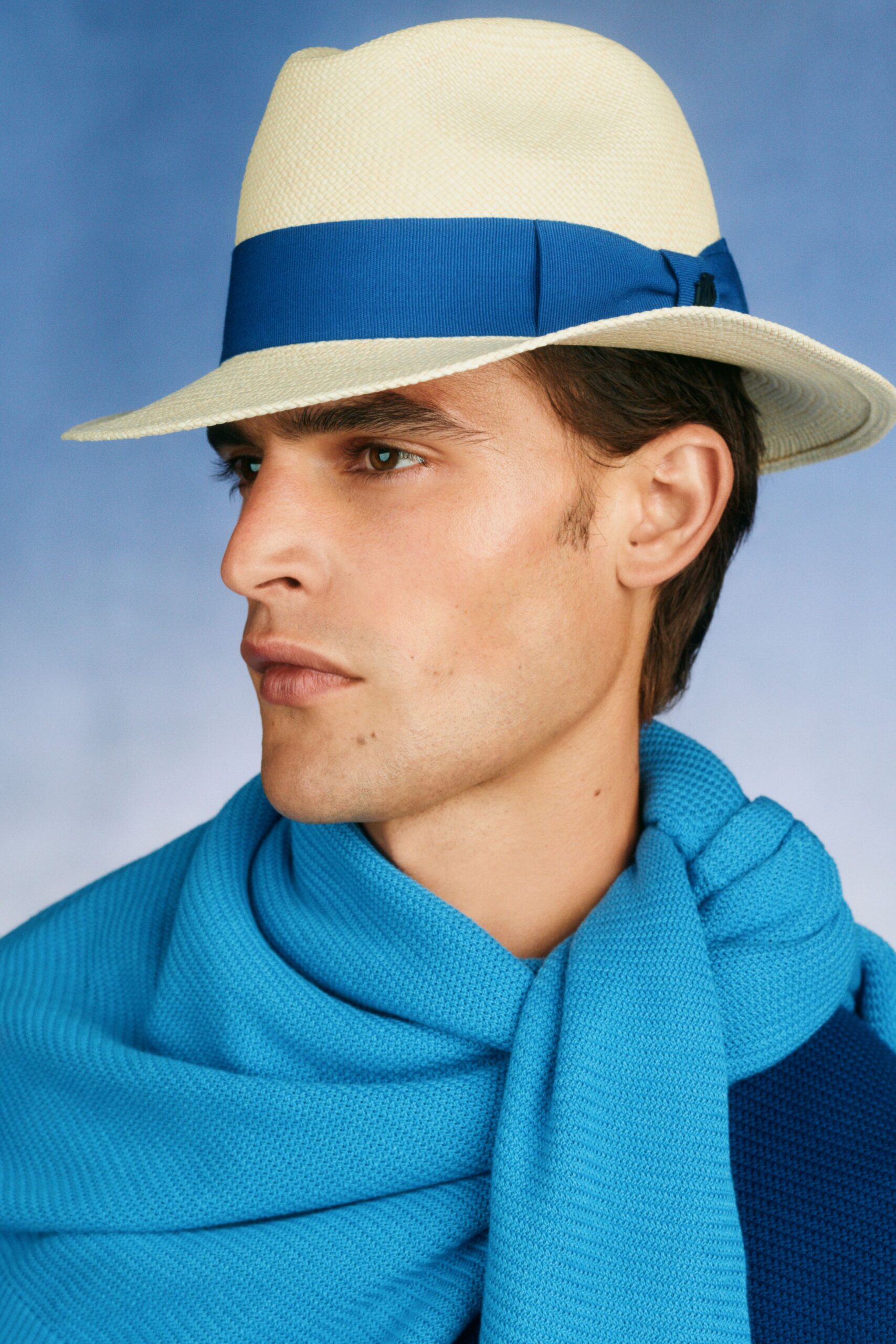 blue cotton scarf and beige hat