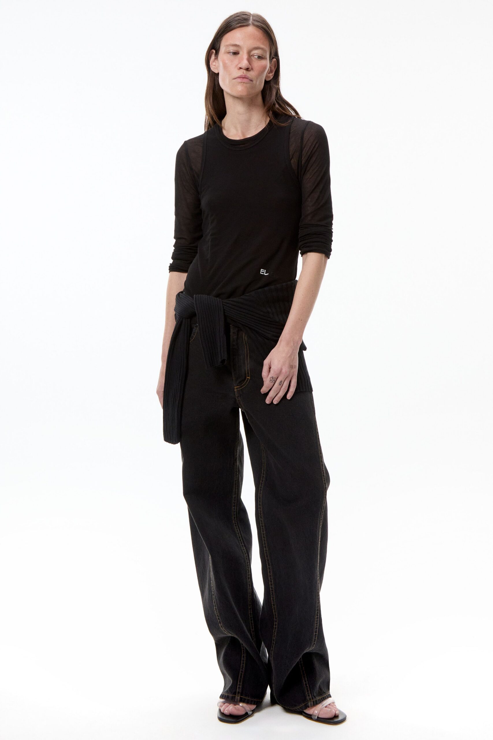 black fitted top and relaxed pants
