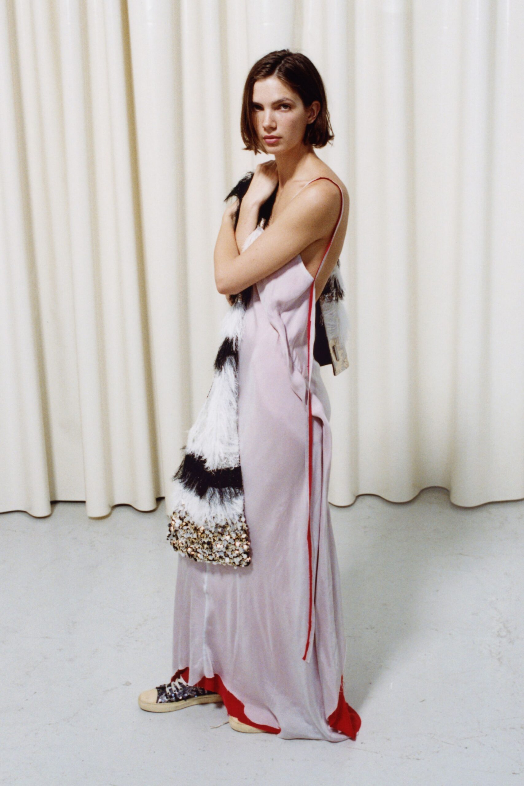 pink silk sleeveless low-cut fitted draped flowing gown
