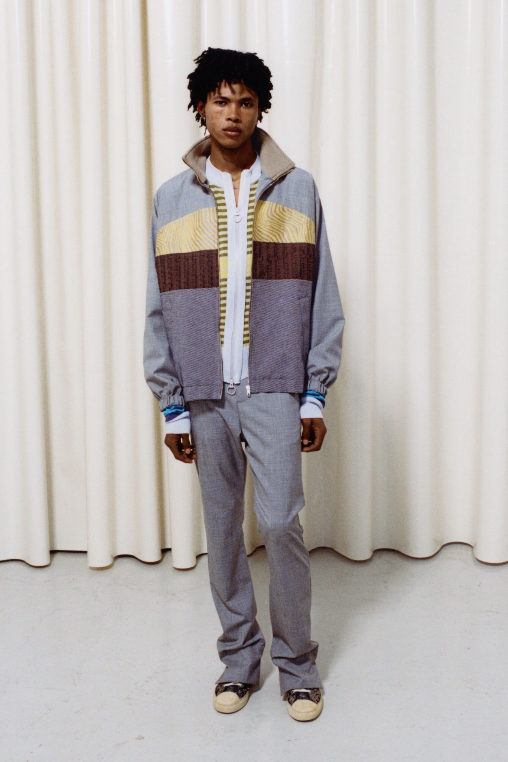 gray color-blocked jacket with slim pants