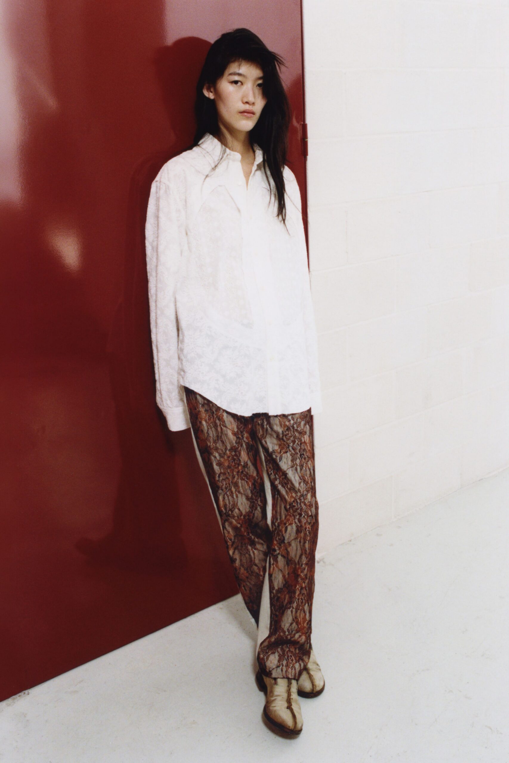 white relaxed shirt with printed pants