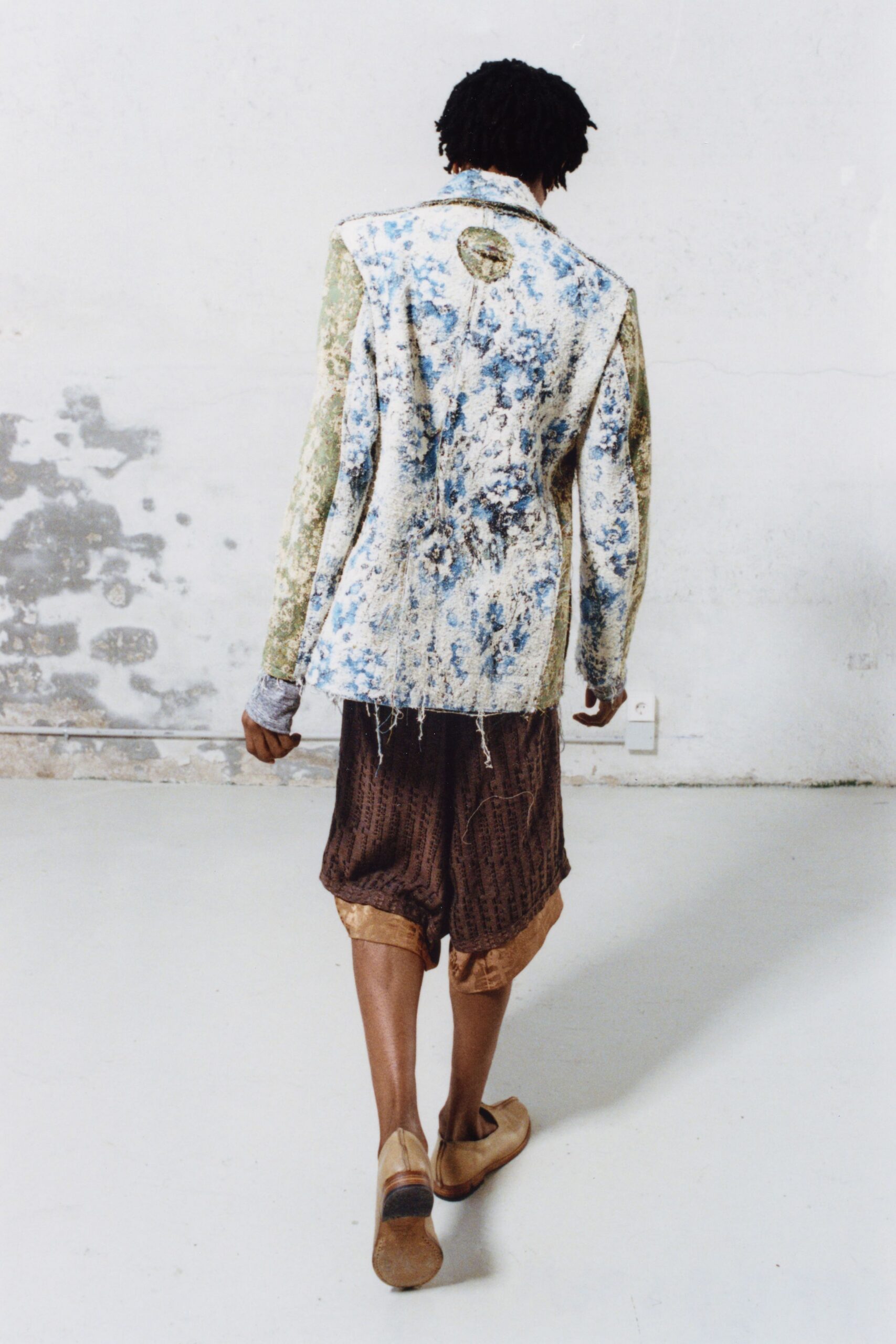 blue and green relaxed blazer with brown shorts