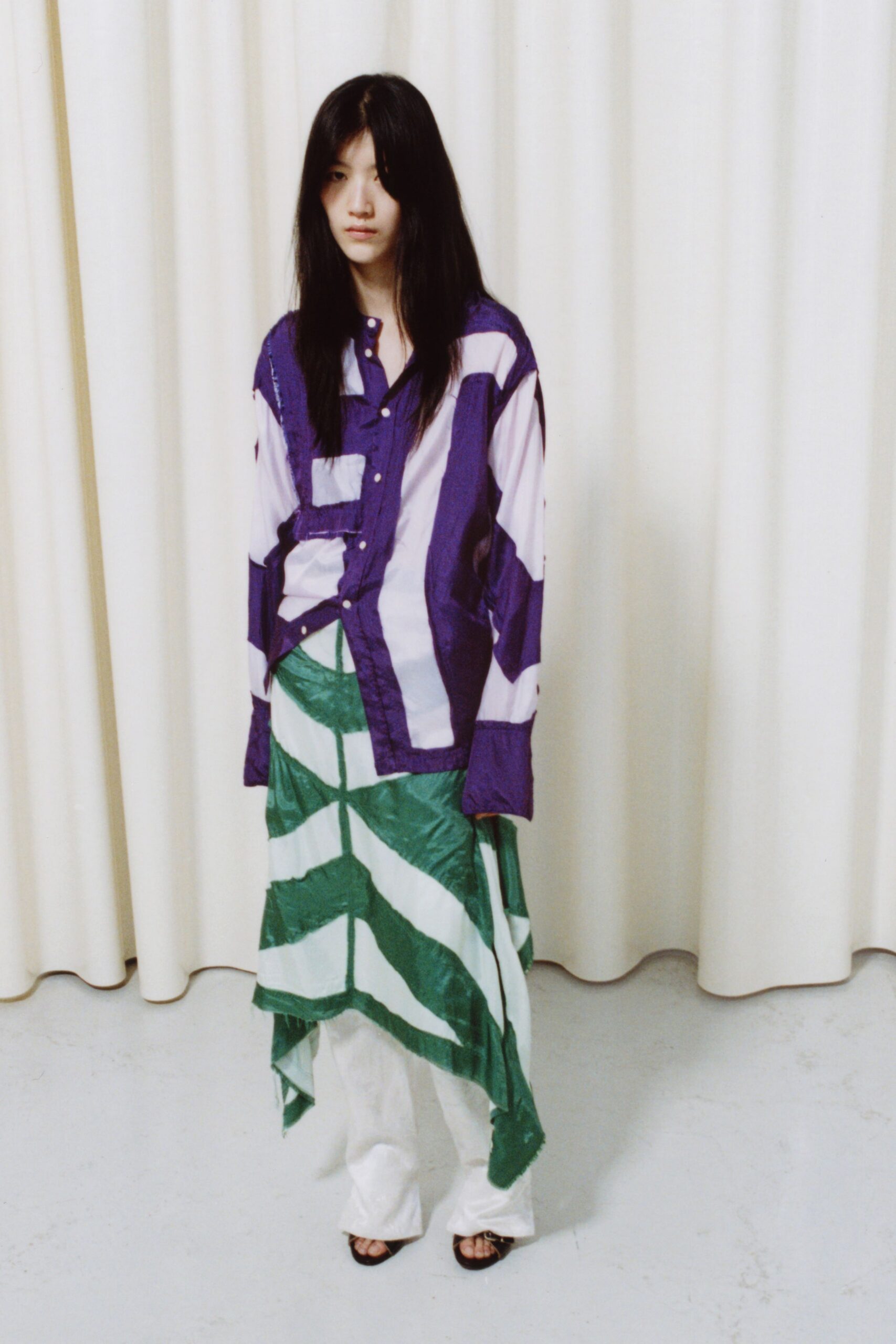 purple striped shirt with asymmetric skirt