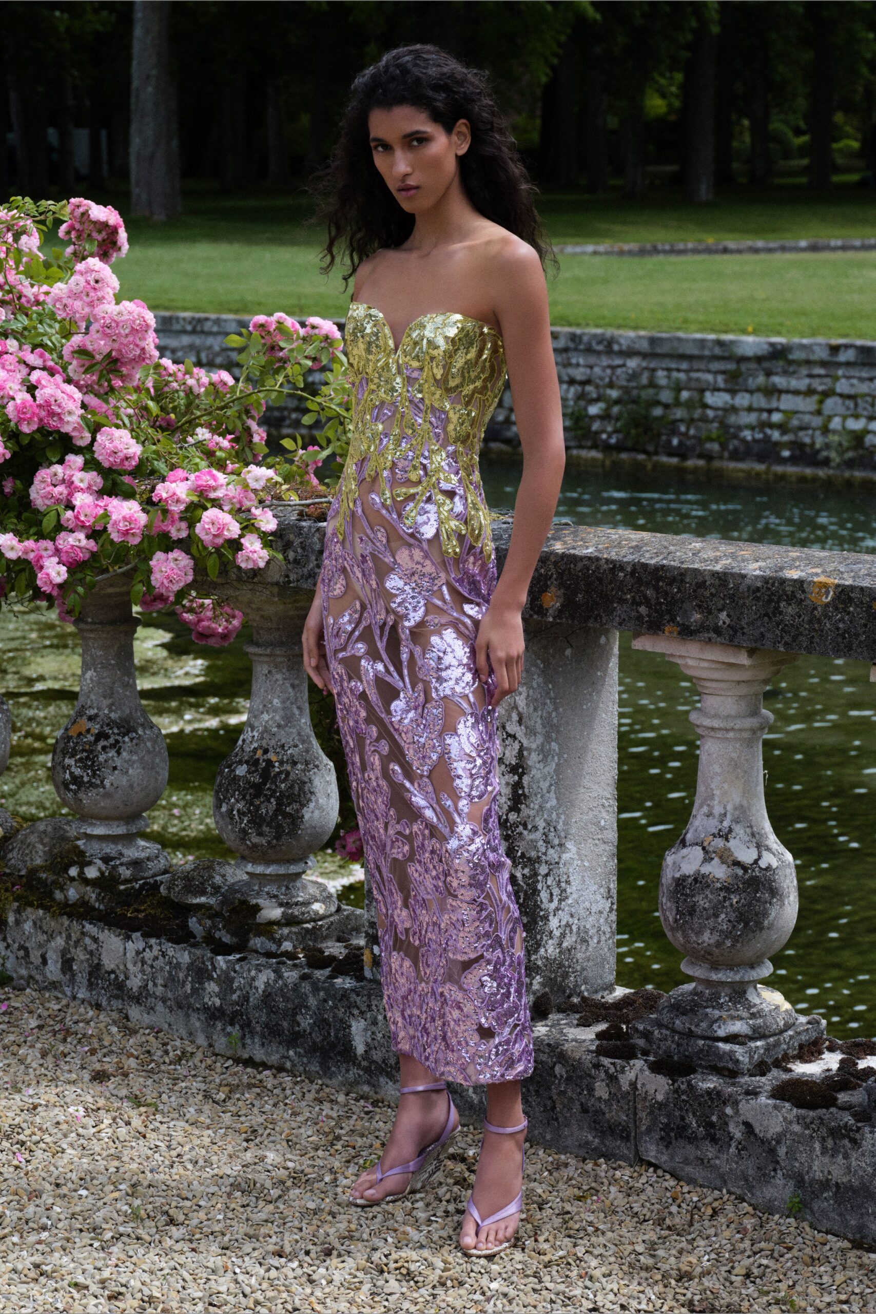 yellow silk strapless fitted embroidered tiered shiny gown