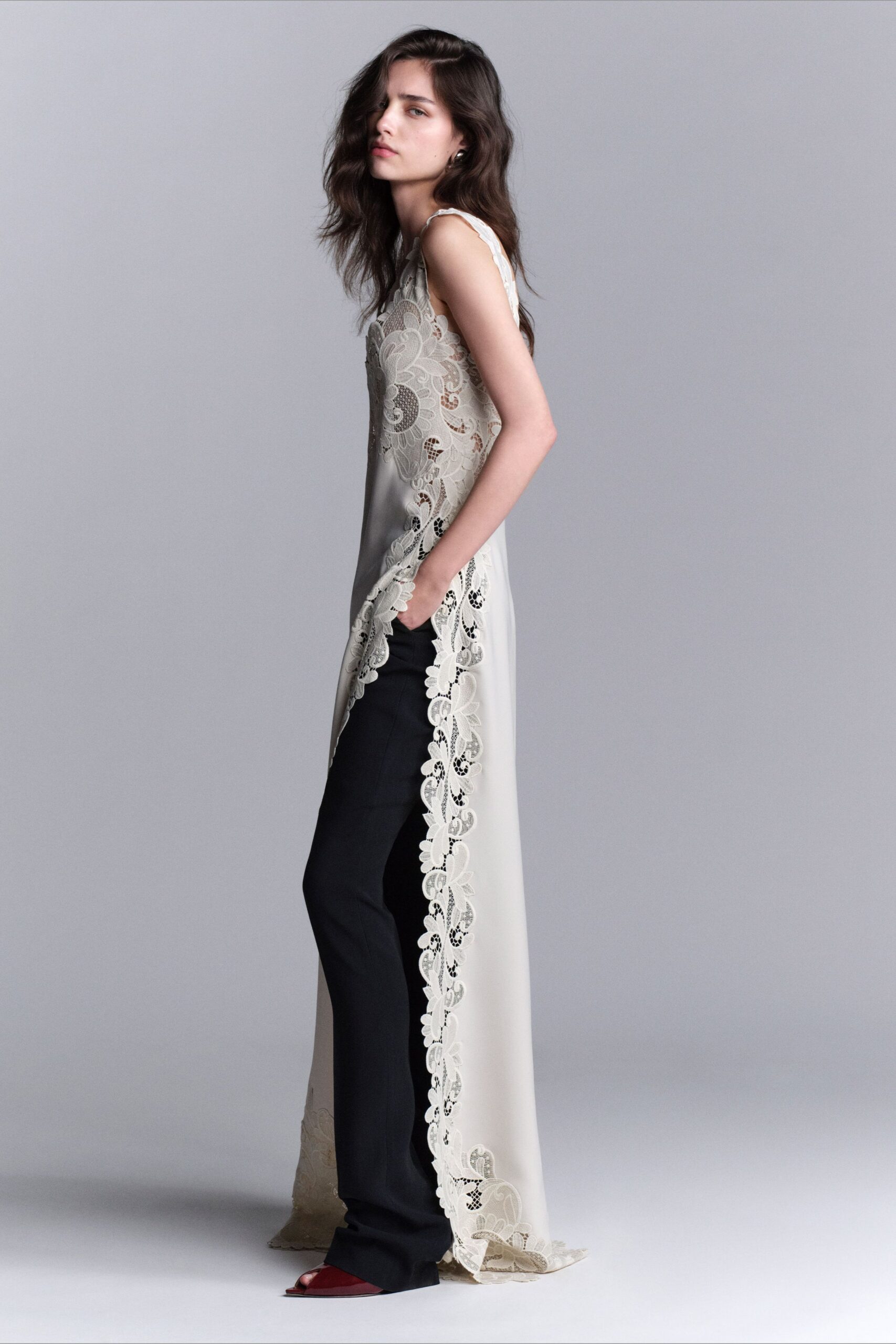 beige silk sleeveless high-neck fitted embroidered flowing gown