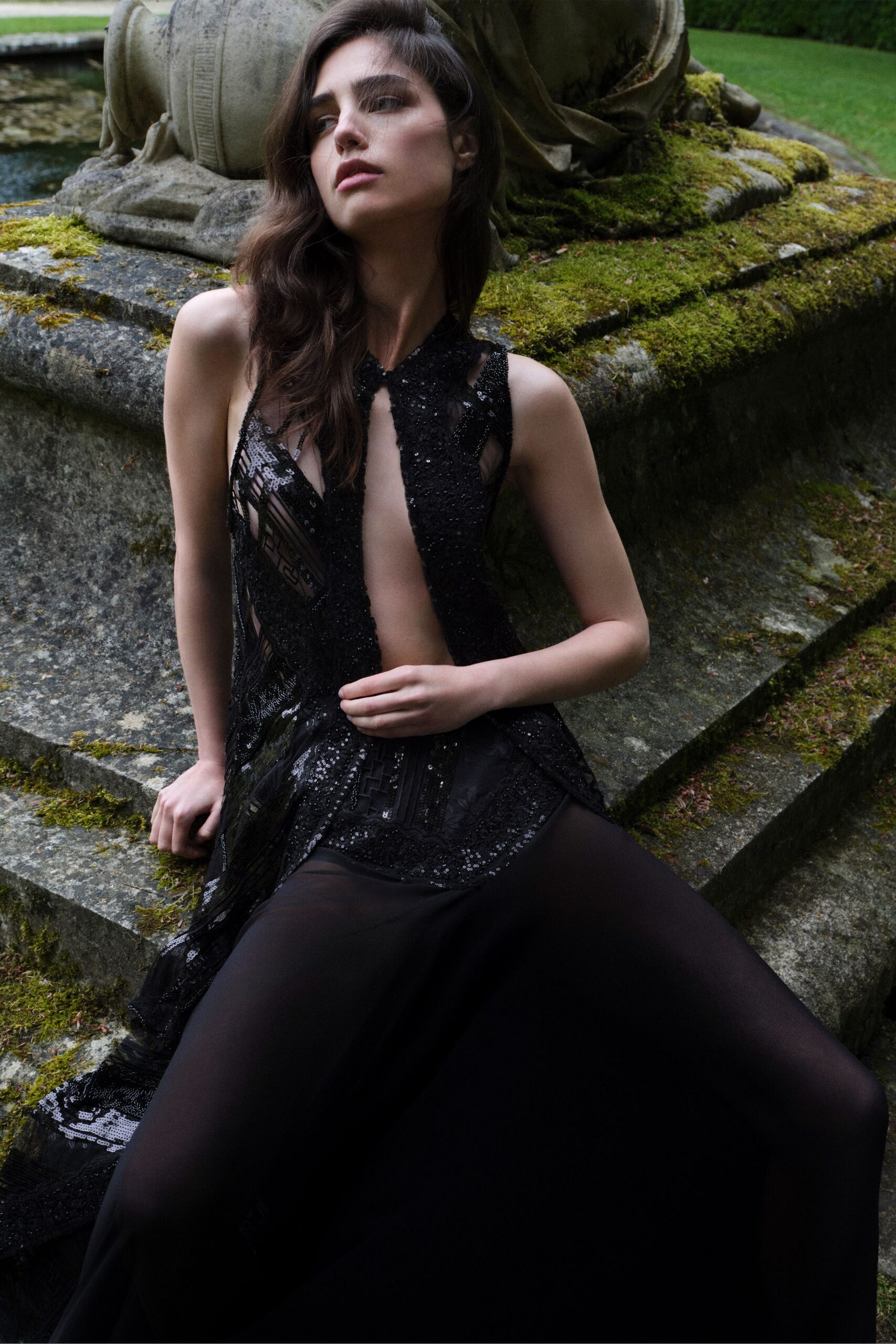 black sequin sleeveless gown