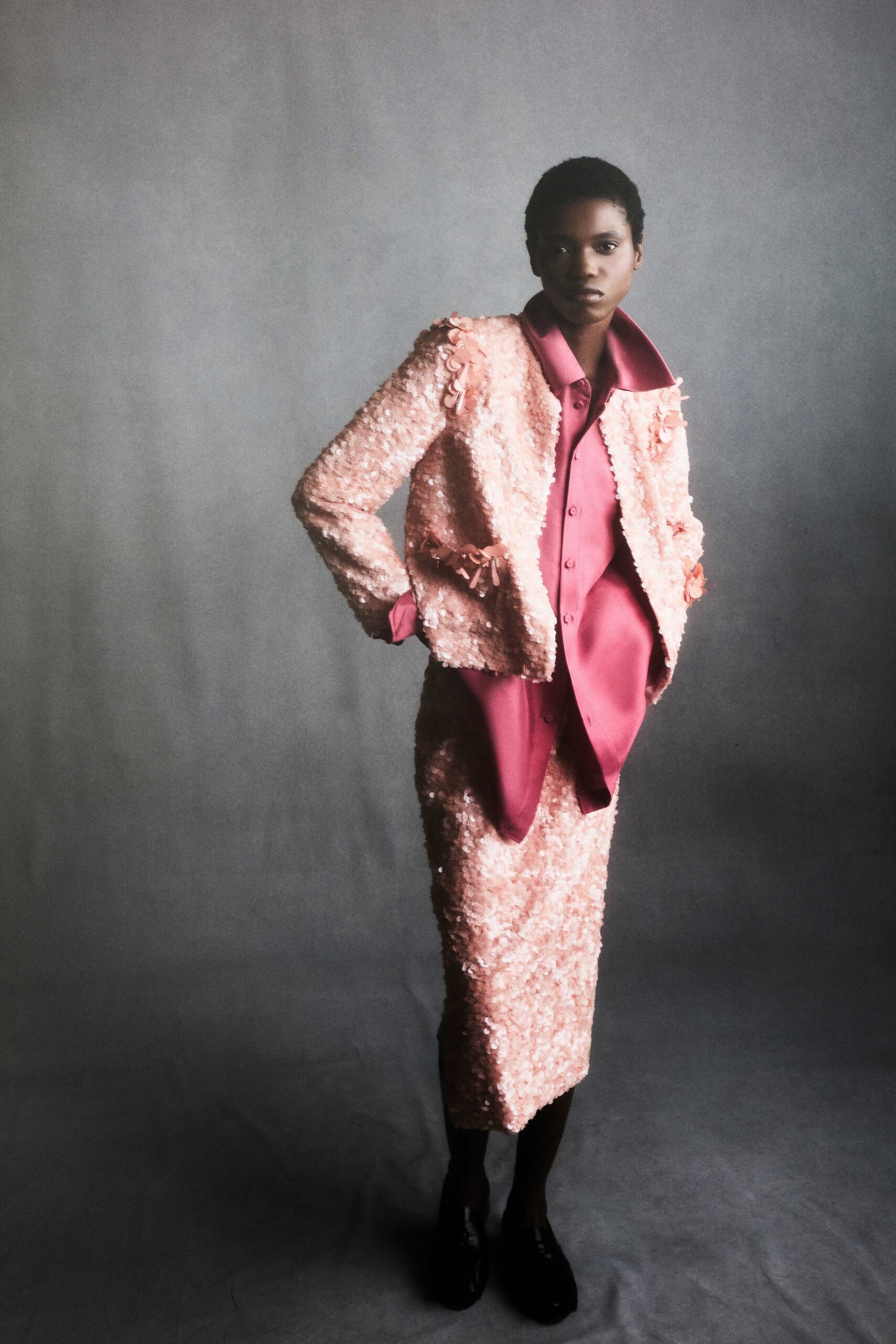 pink silk long-sleeve collared fitted ruffled jacket