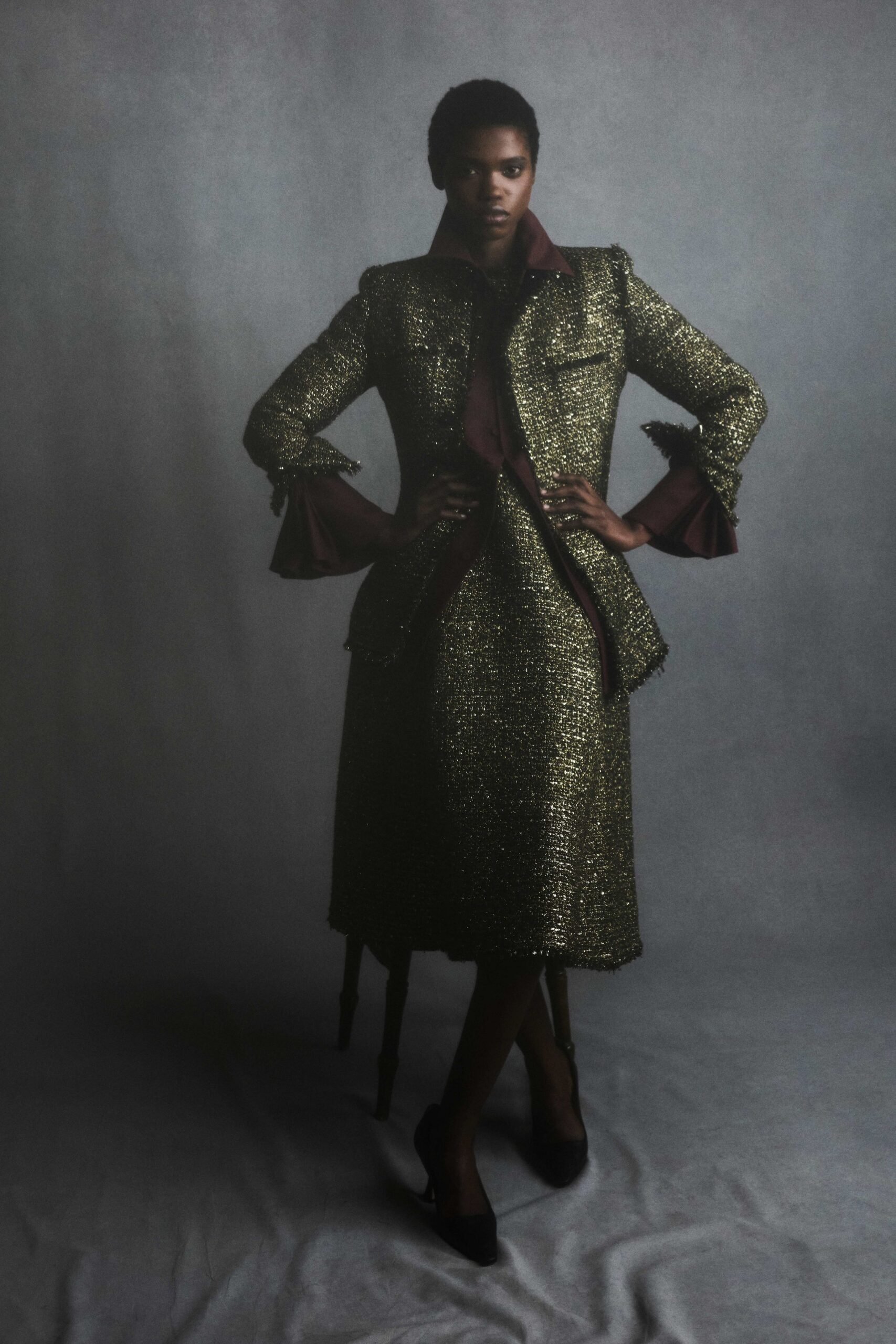 gold silk long-sleeve collared fitted buttoned pleated dress
