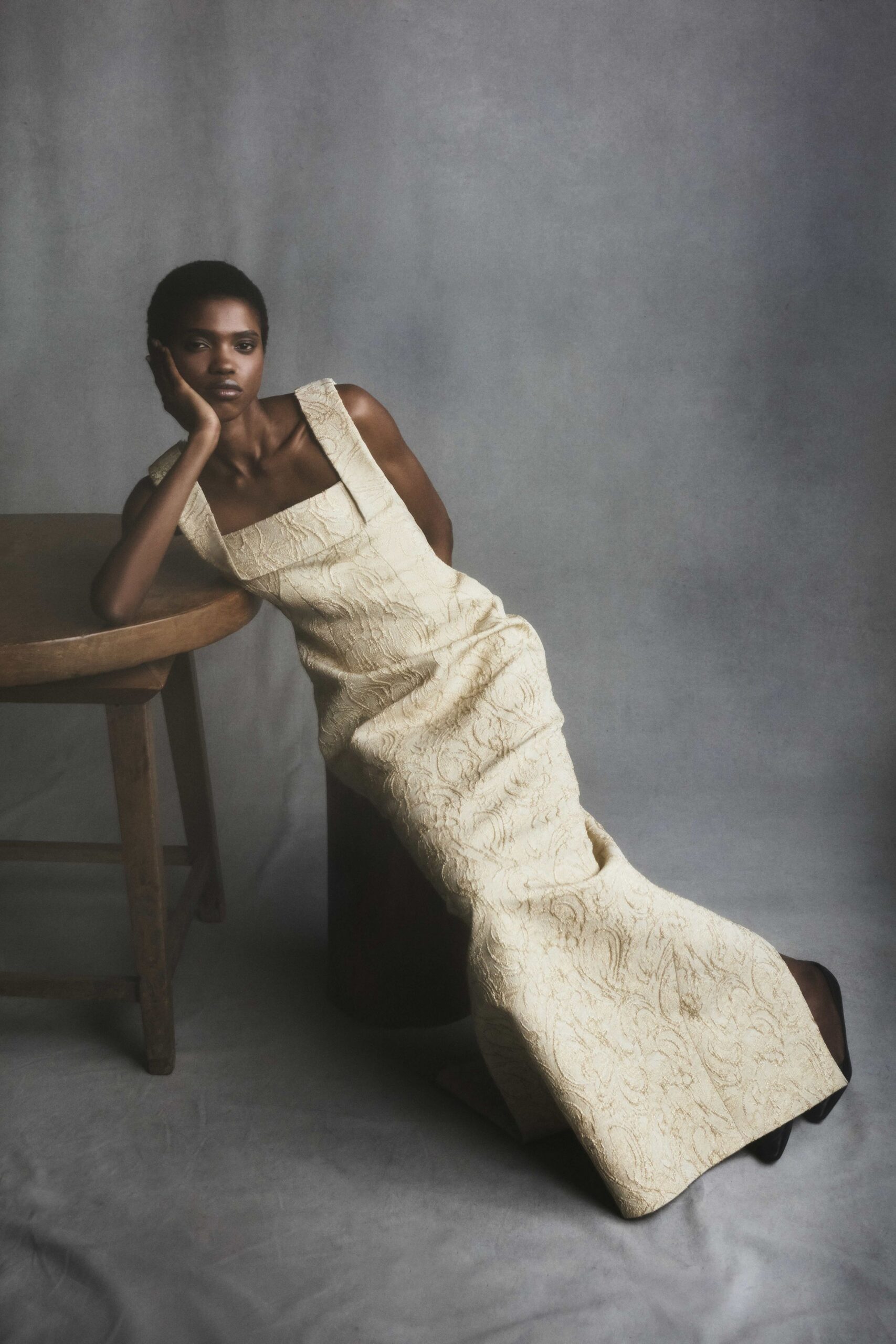 beige lace sleeveless gown